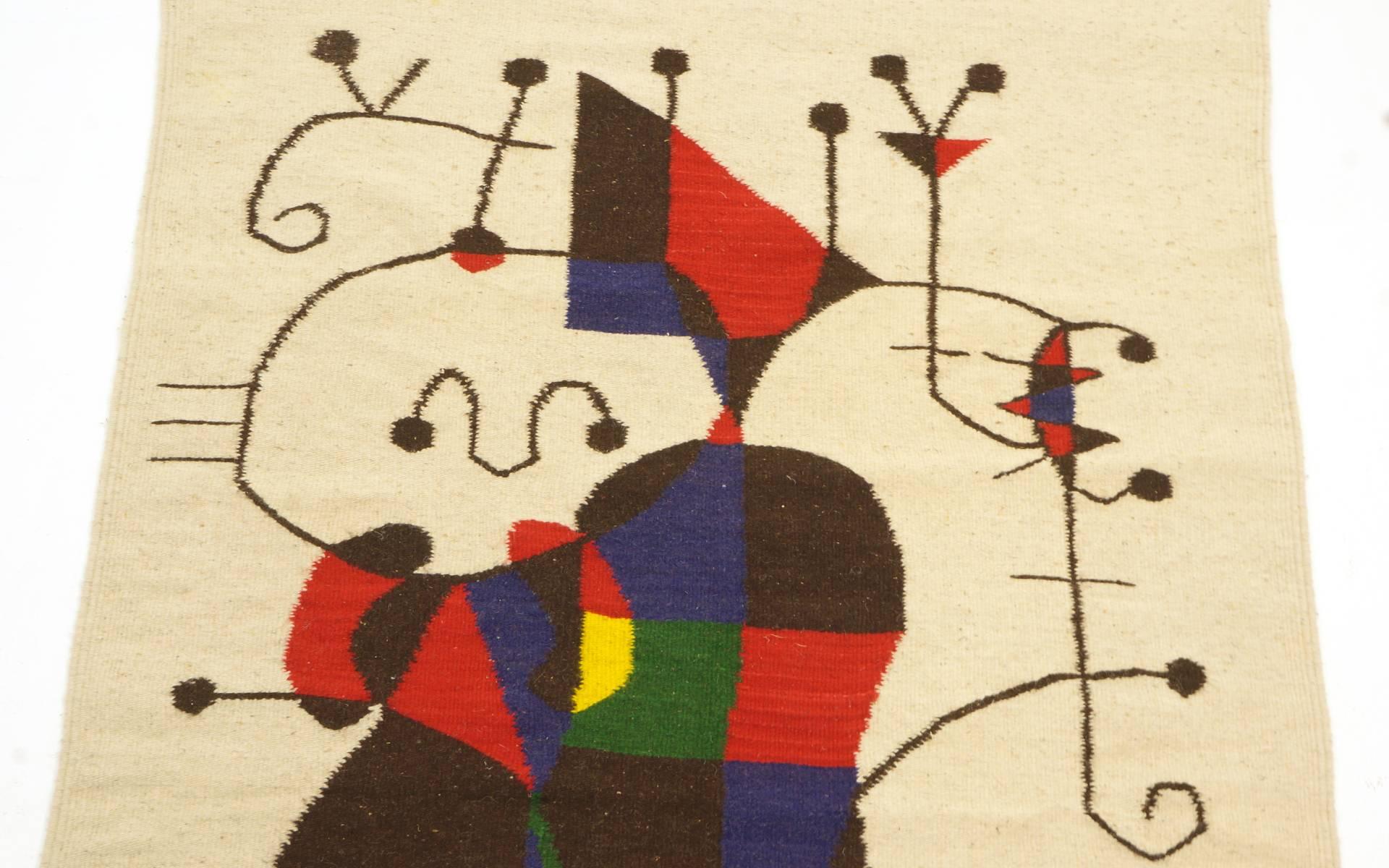 Colorful textile tapestry wall hanging in the style of Joan Miro. Very good condition. No tears or holes. Some pilling to the wool.