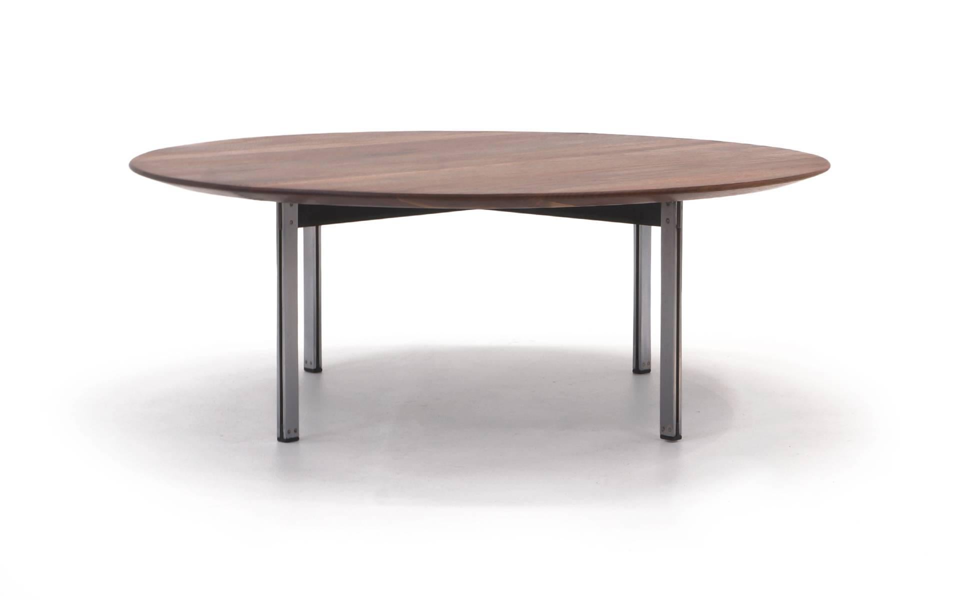 Solid walnut Florence Knoll coffee or cocktail table with chromed steel legs from the ParallelB series. The top has that beautiful Knoll beveled edge on the underside that gives it a light look while being a full one inch think top. Expertly