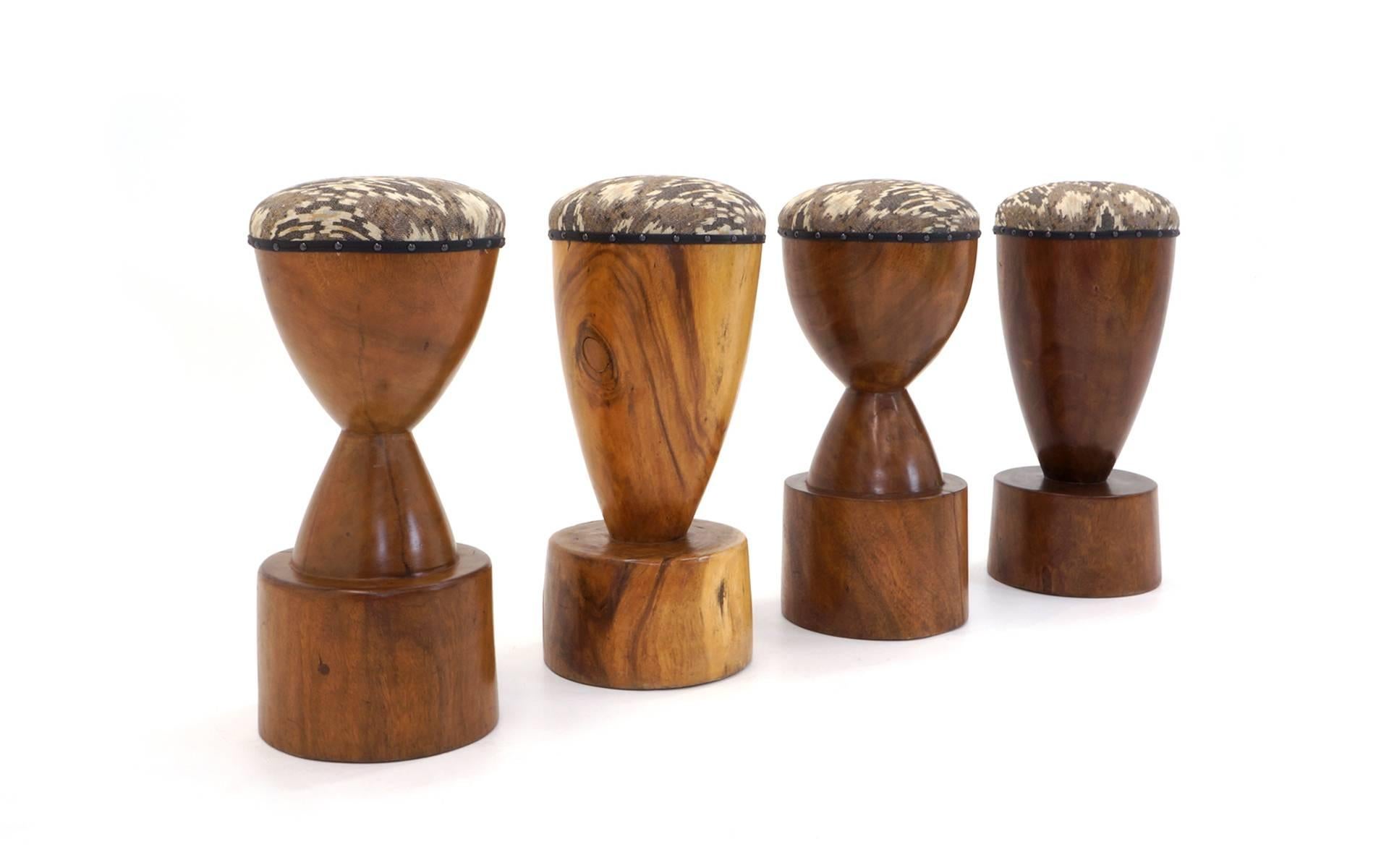 Unique set of barstools reminiscent chess pieces. Carved from solid walnut and exotic woods. Great set.