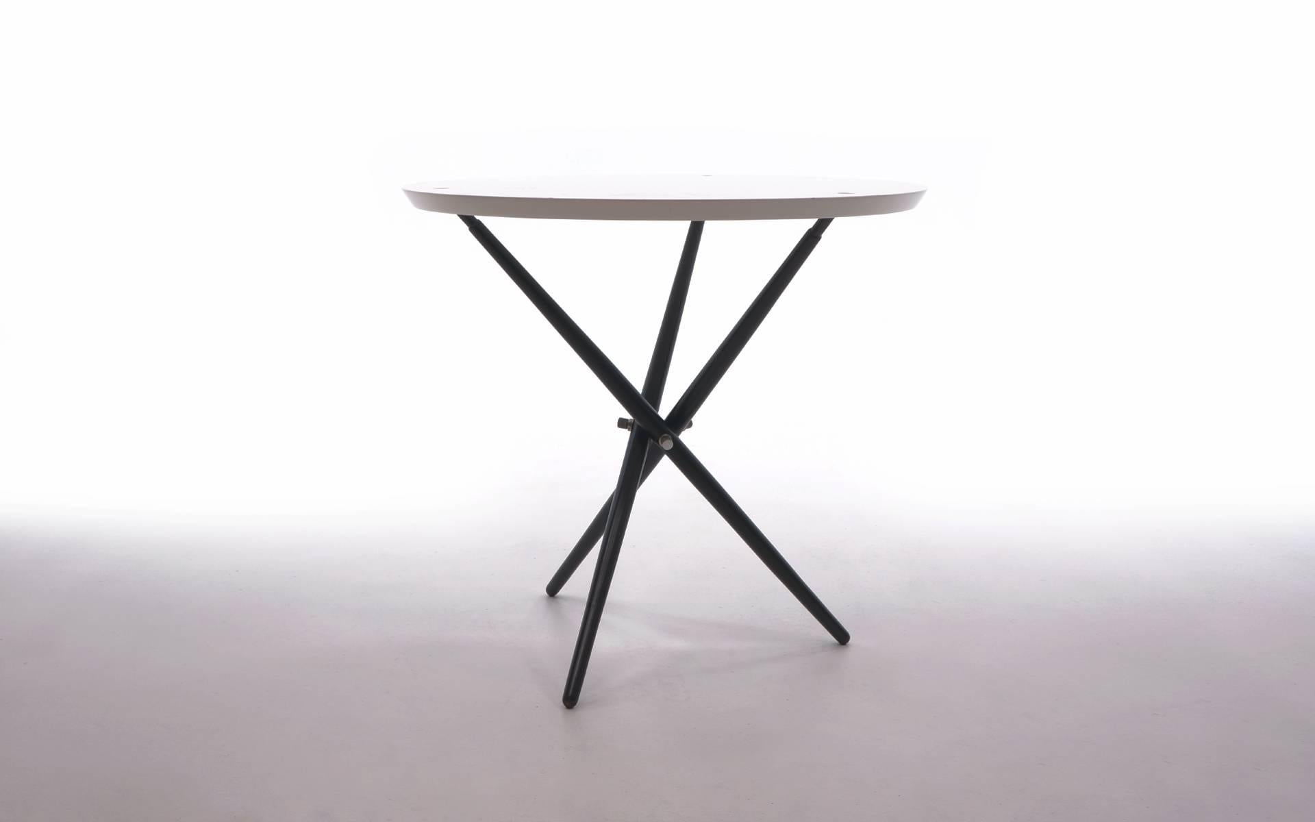 Hans Bellman side table with white laminate top and black lacquered legs.