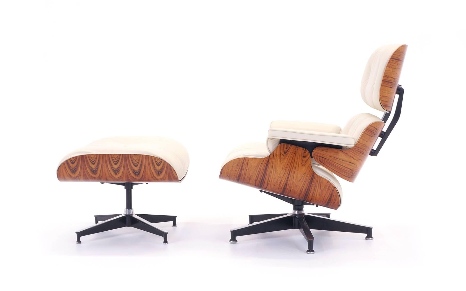 This is the best of both worlds: A 1970s original rosewood Eames chair and ottoman with new Herman Miller ivory cushions. Excellent example of this iconic design. Chair dimensions are below. Ottoman dimensions are:
Height 15 in,
width 25.5