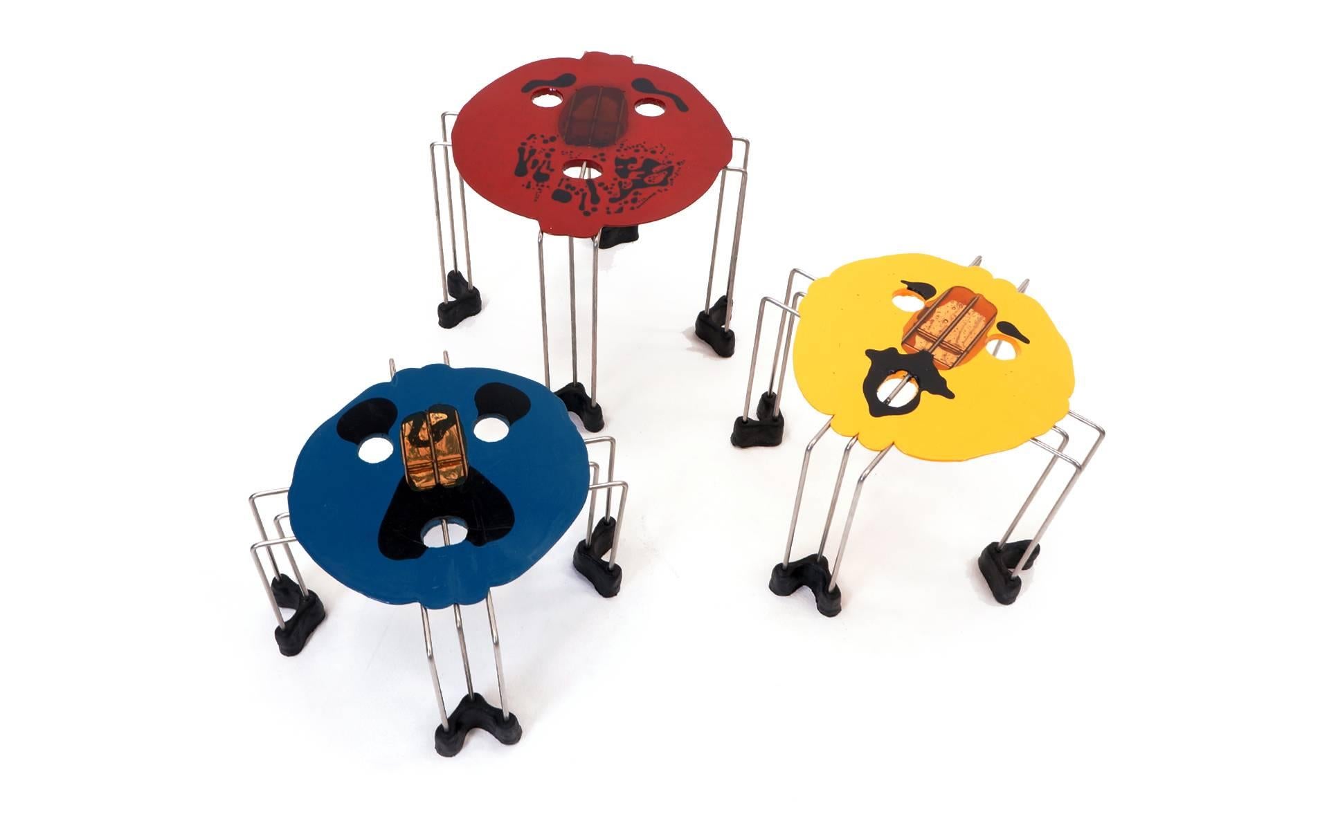 Red, blue and yellow with multiple colors, set of three Gaetano Pesce nesting table. Like new condition. Signed.
Height measurements are 14.25 in., 11.25 in., and 8.75 in.