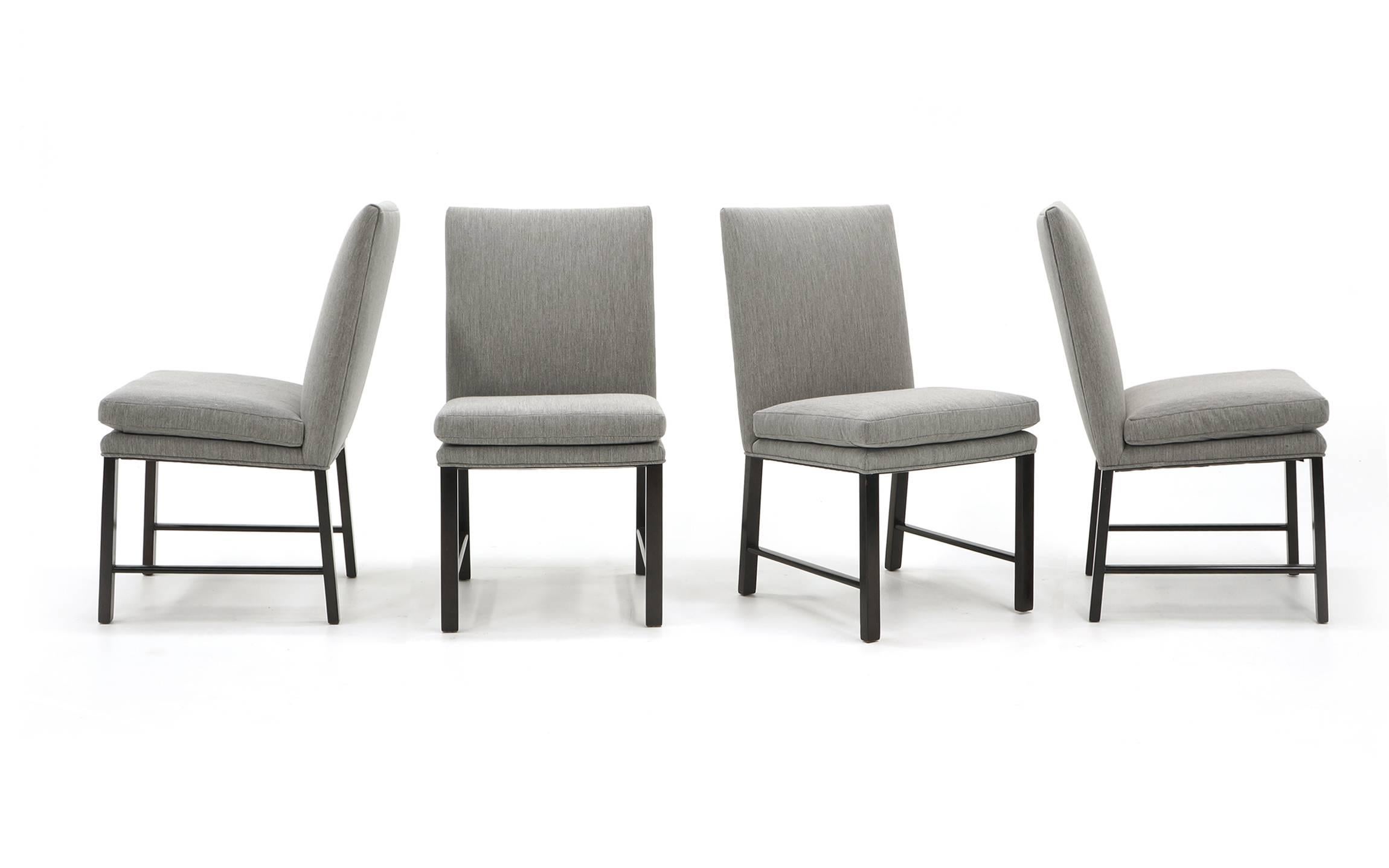 Set of eight dining chairs designed by Paul Evans and produced by Directional. Two armchairs and six side chairs, all expertly reupholstered a grey Maharam fabric. Great style and comfortable enough to sit in for hours.

Armchair dimensions
37