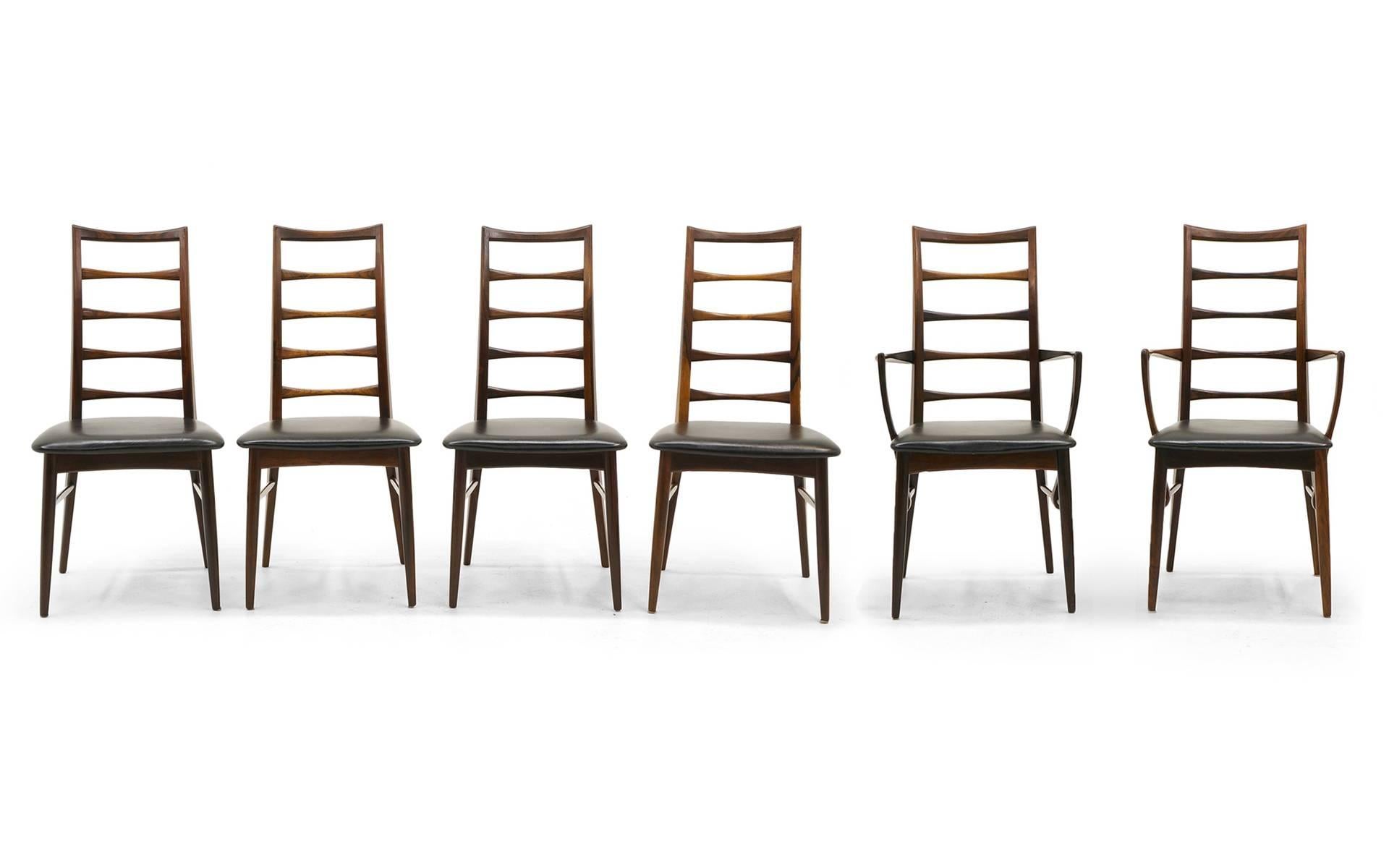 Set of 6 dining chairs in Brazilian rosewood designed by Niels Kofoed. Two armchairs and six armless chairs. Excellent examples of this Danish modern design. Rare set of 6, all rosewood.
Armchair dimensions
37.5 in H x 17 in D x 21.5 in W
17.5 in.