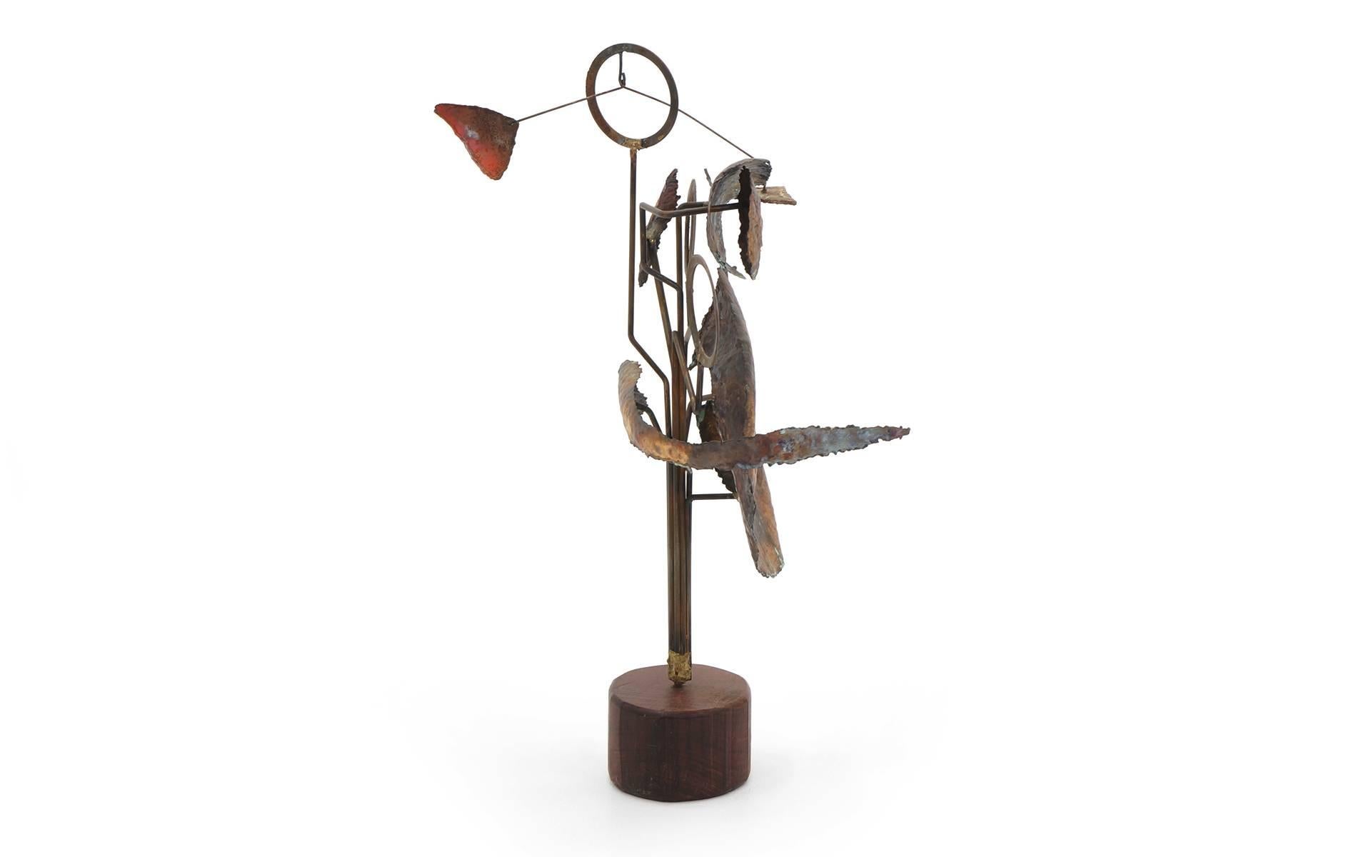 Tabletop sculpture of torch cut steel and applied patina by artist James Bearden. This complex work features a Kinetic or mobile element on the top portion.