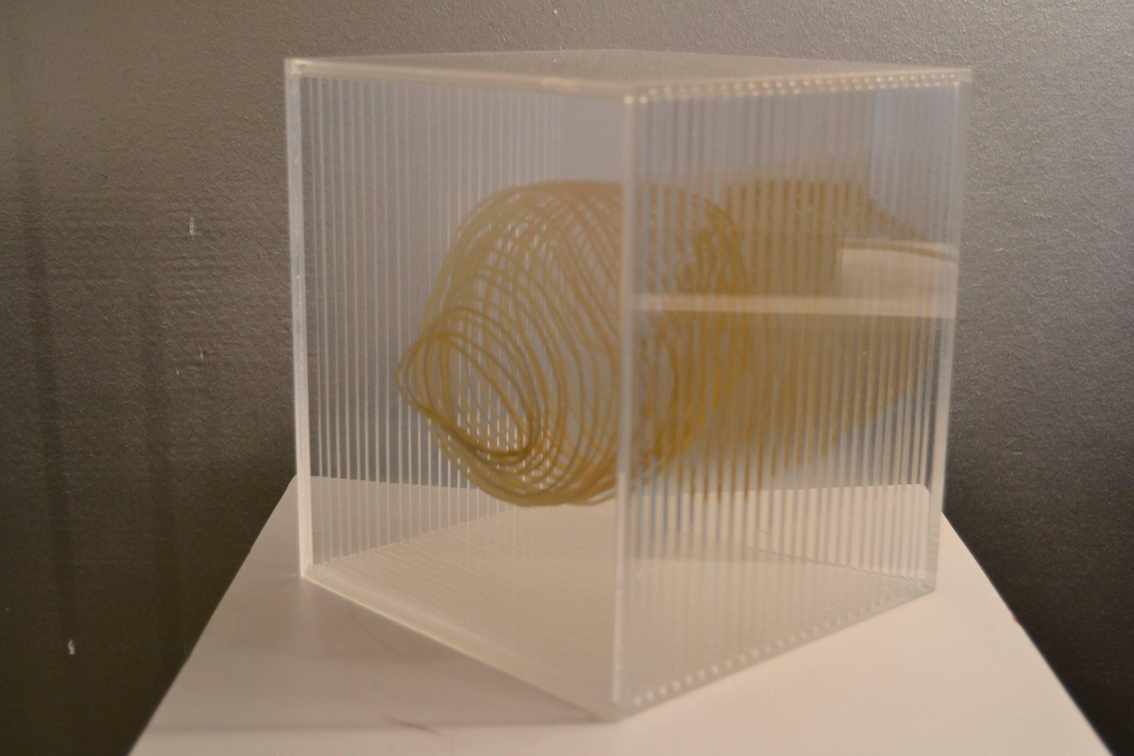Contemporary Lucite sheets and gold leaf cube sculpture by the talented Spanish artist Isabel Alonso Vega.