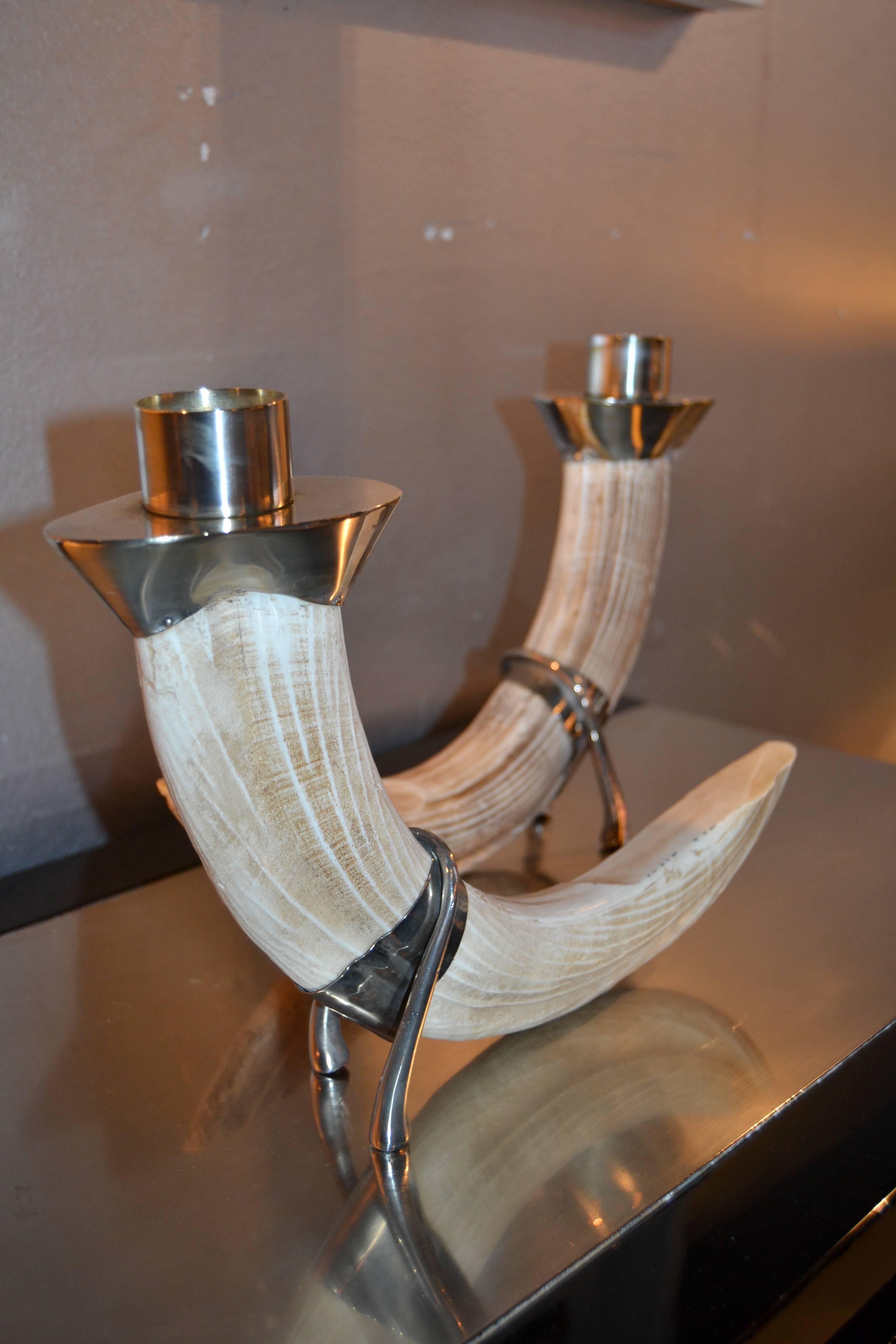 1970s Christian Dior faux resin tusk and silver plated candlesticks.
Signed Christian Dior.
Great vintage condition.