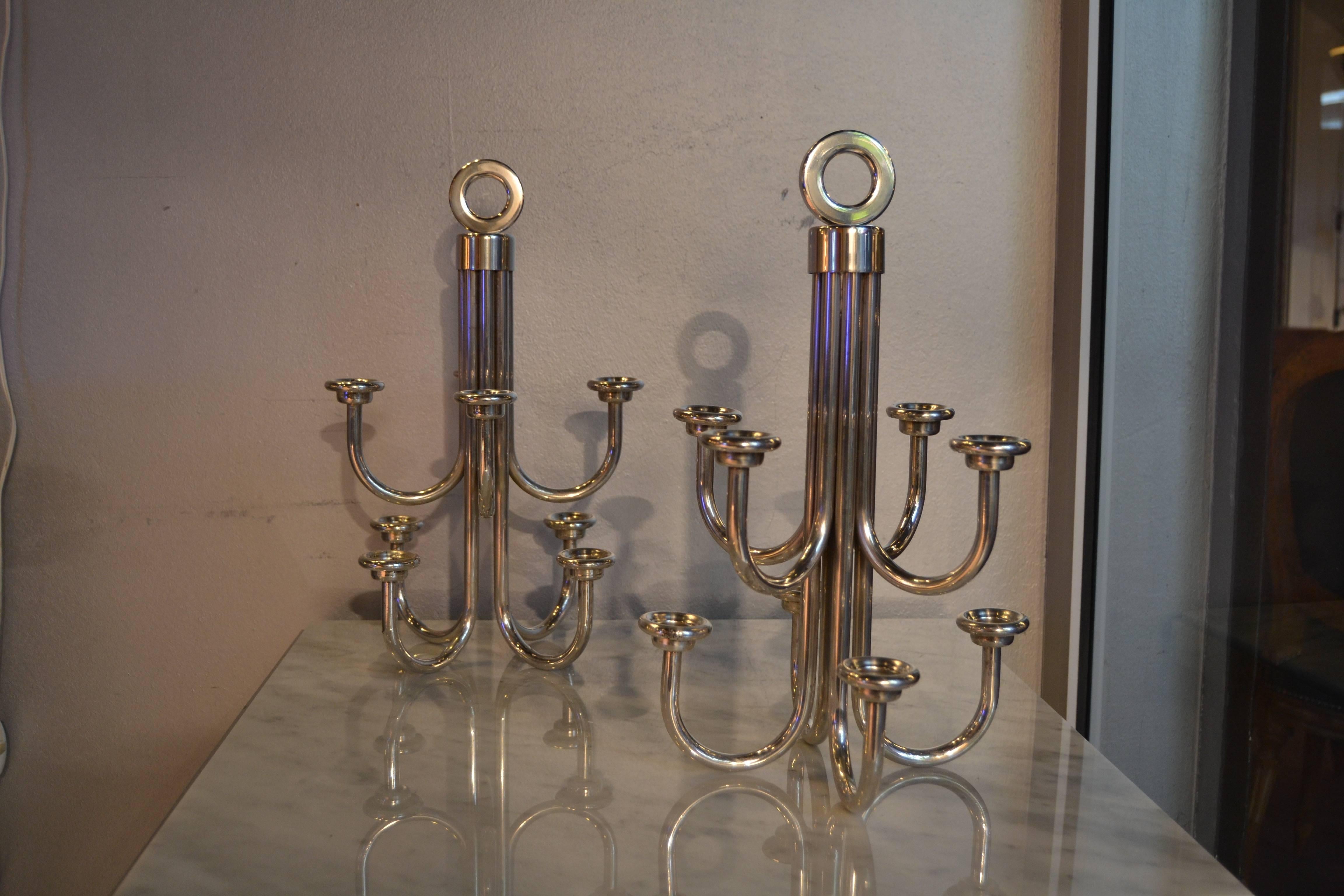 Pair of 1950 candle holders on silver plated metal with.
Great vintage condition for this elegant pair of candle holders.