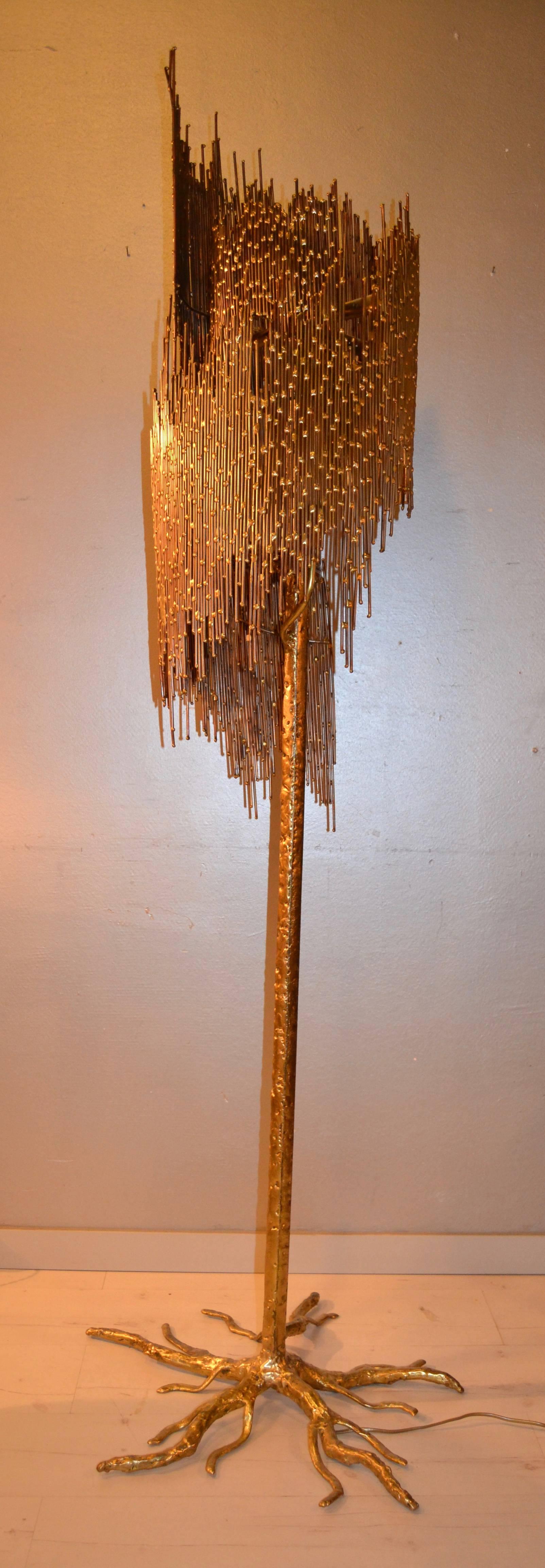 1970s brass and bronze sculptural floor lamp signed on the base by Henri Fernandez
Great condition.