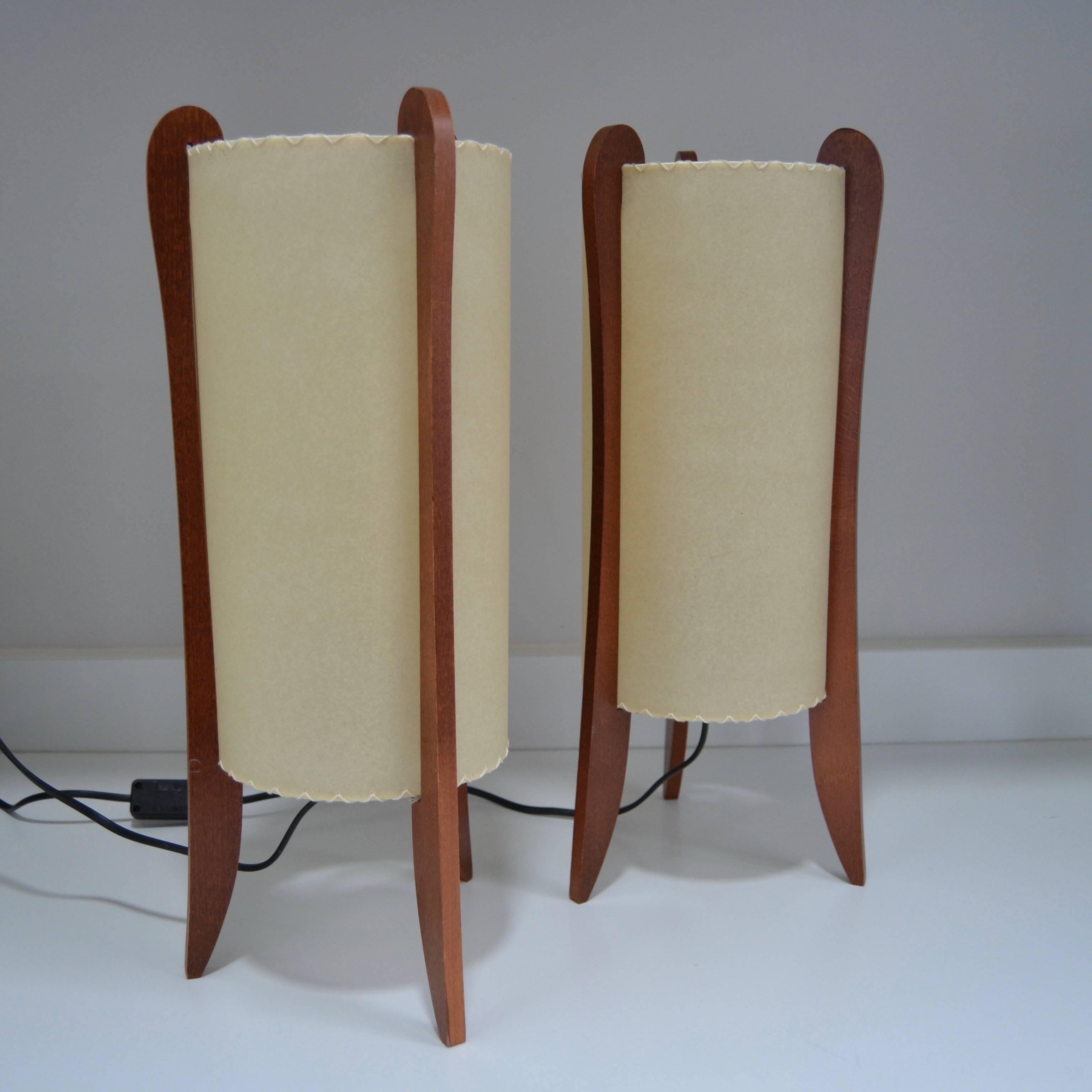 Pair of table lamps from late 1970s mahogany and goatskin shades
Great vintage condition.
