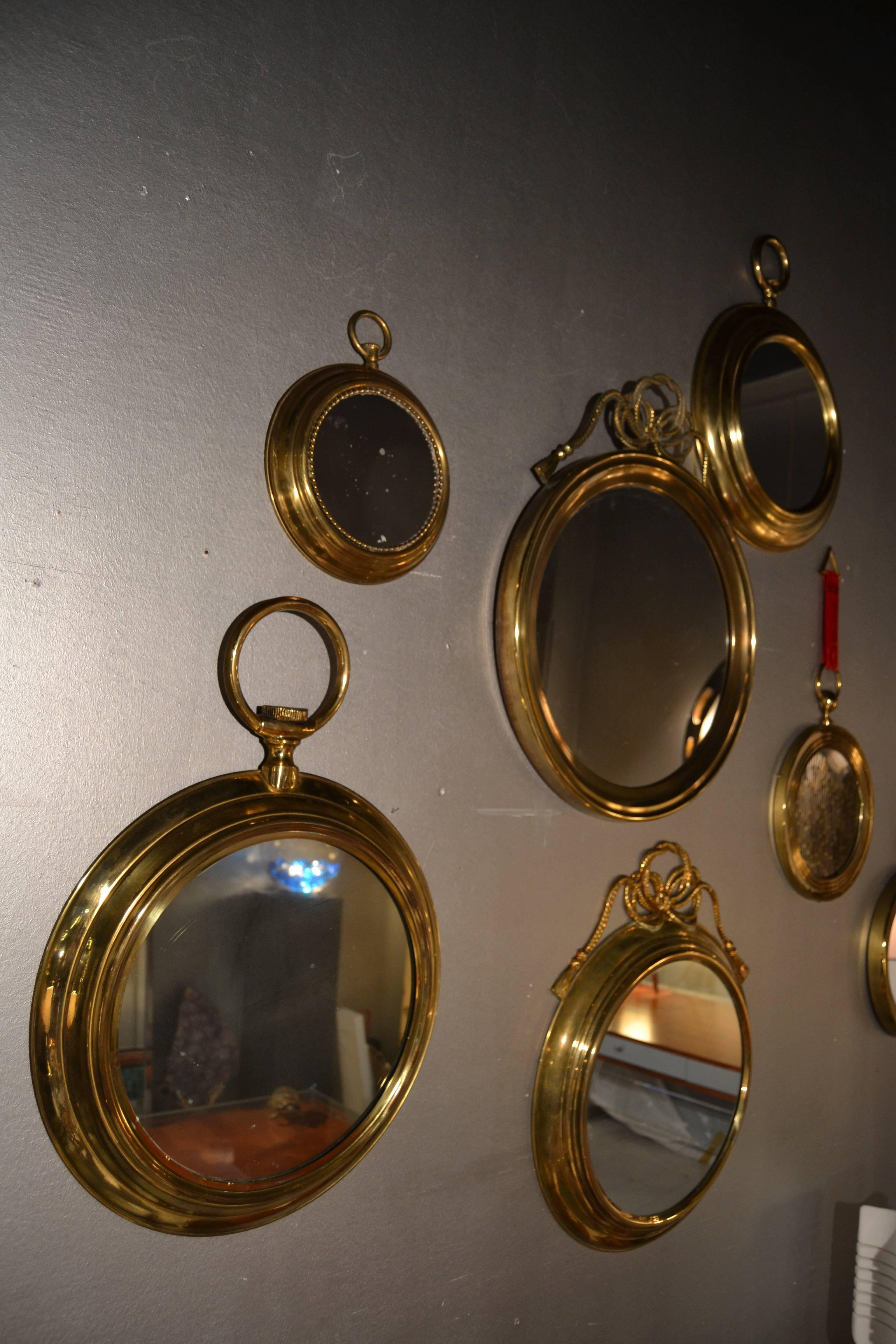 Italian 1970s Set of Seven Brass Round Mirrors