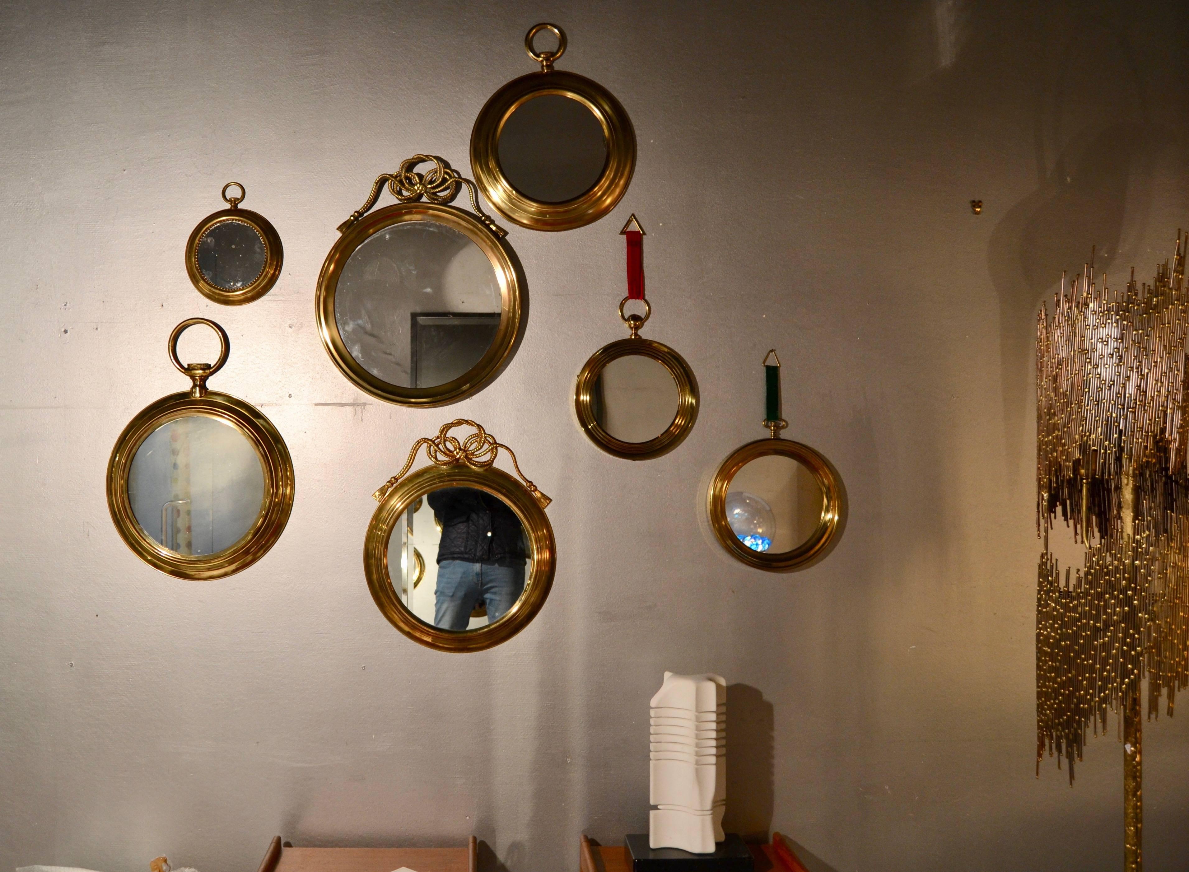 Late 20th Century 1970s Set of Seven Brass Round Mirrors