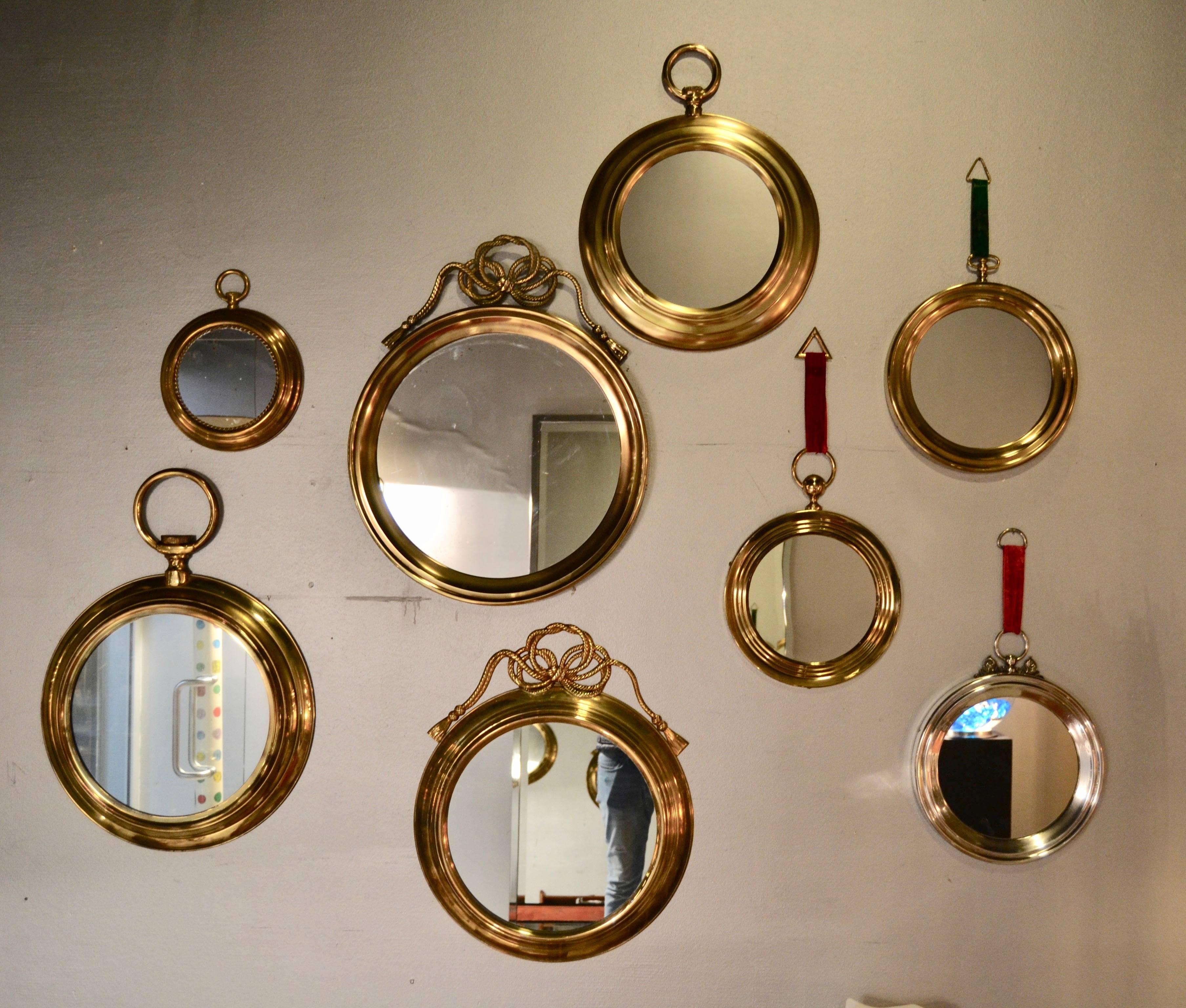 Set of seven brass and bronze Italian mirrors. Good vintage condition
Larger diameter is 65cm-25 inch
smallest diameter is 32cm -12 inch.
 