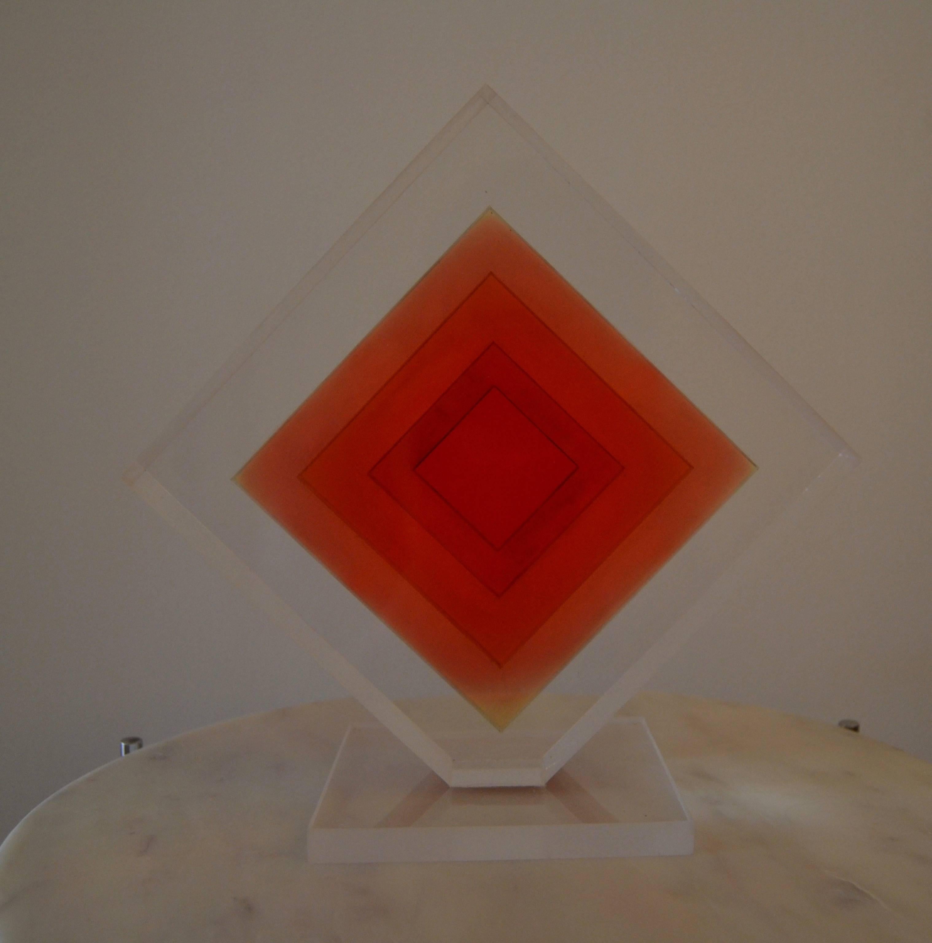 1970s Lucite clear sculpture with red movement.