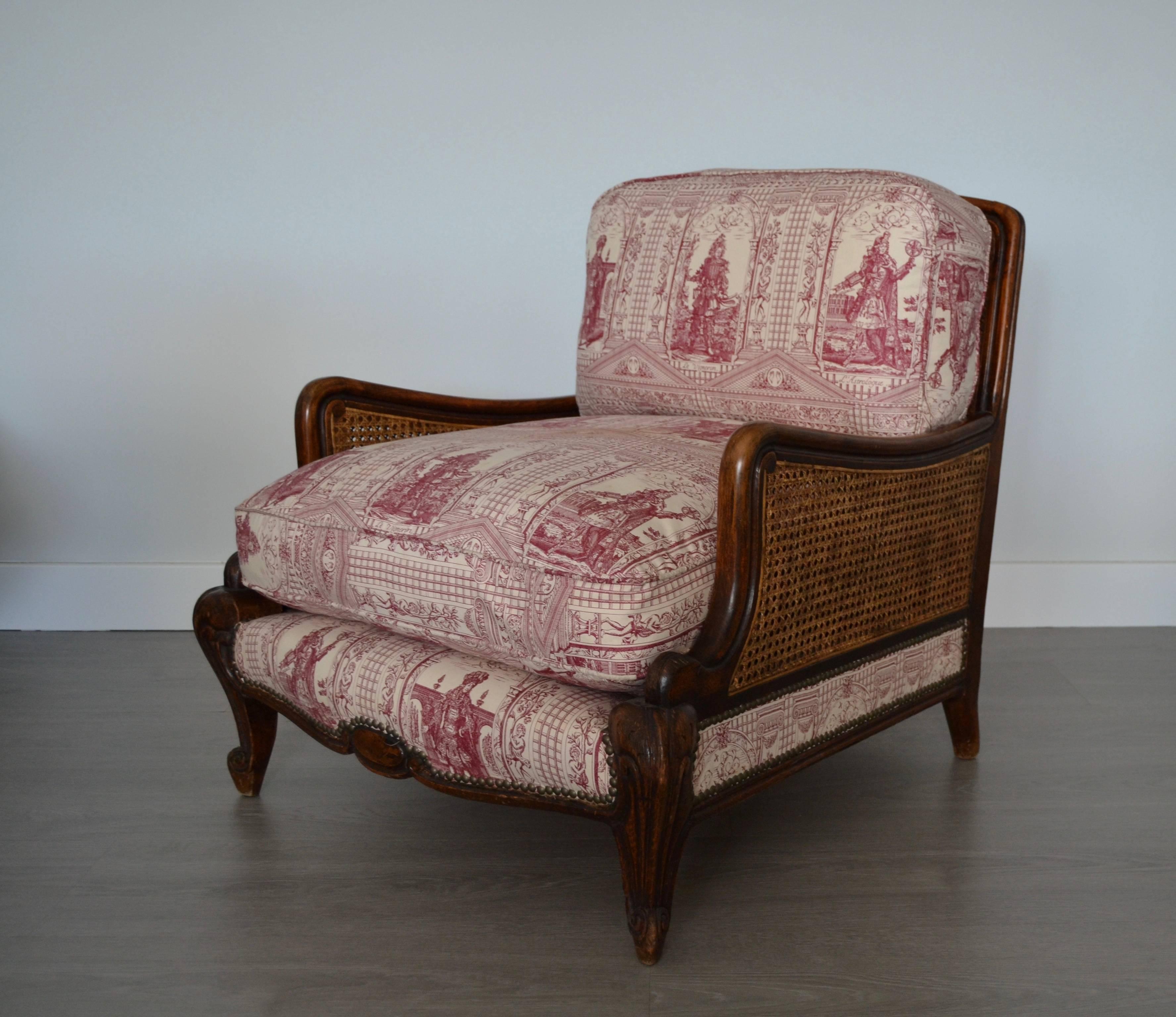 Wood and wicker armchair upholstered with toile de jouy, 1900.
Good vintage condition.