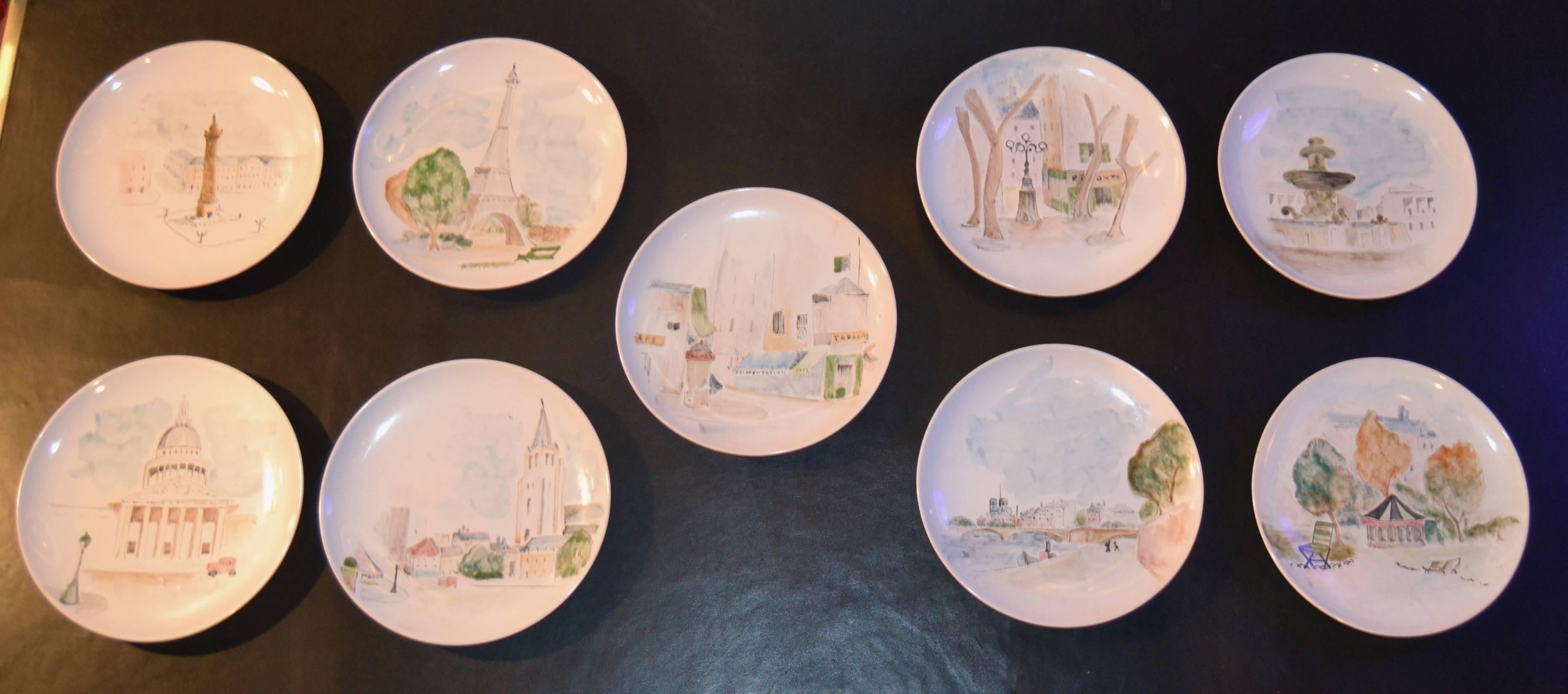 Set of nine plates in Faince  with the views of Paris. Signed on the back. France, circa 1960.
 