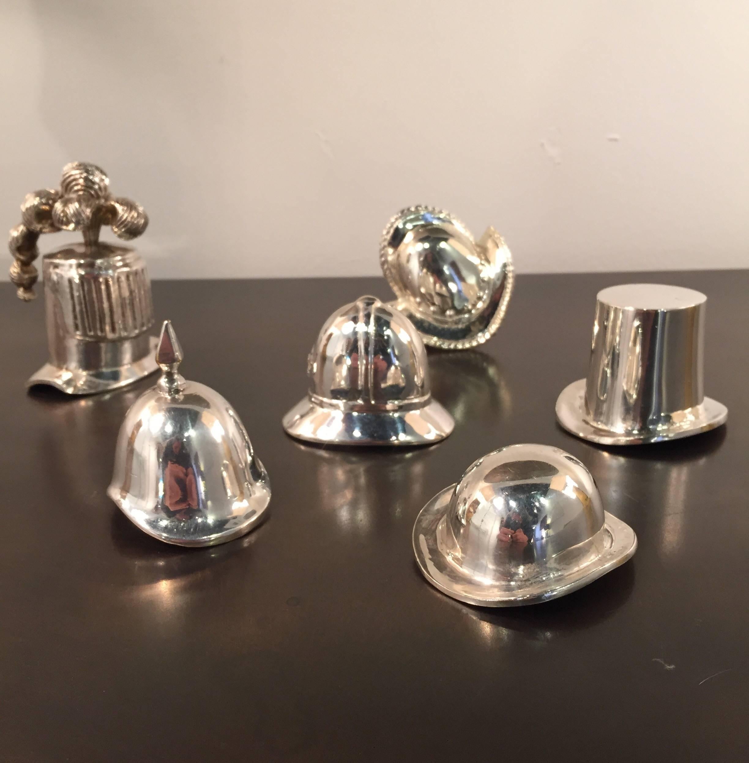 Collection of six hats in silvered bronze. Great quality.