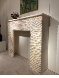 Chimenea escultórica de mármol