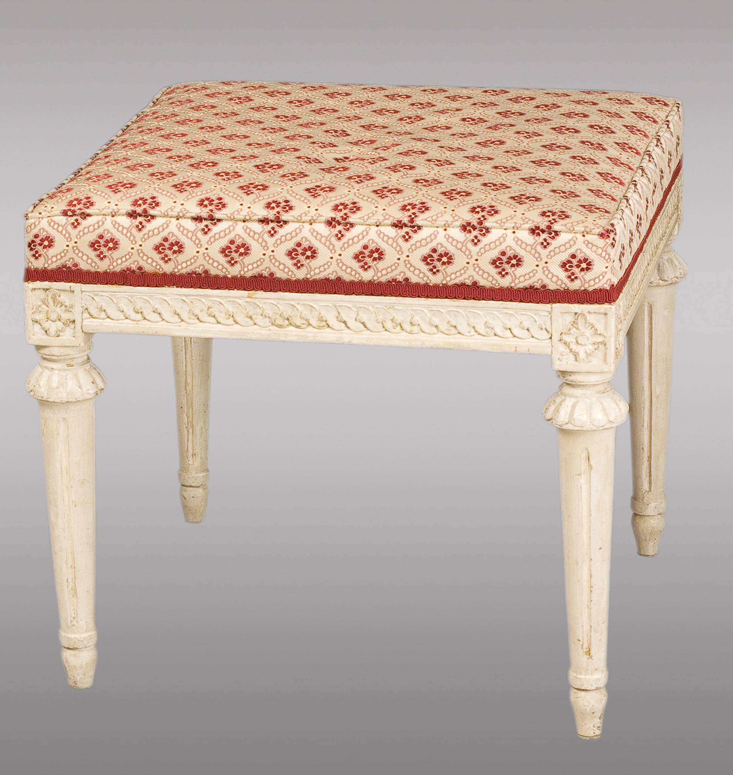 Pair of carved wood Swedish stools, 18th century
Upholstered in Rubelli silk.


