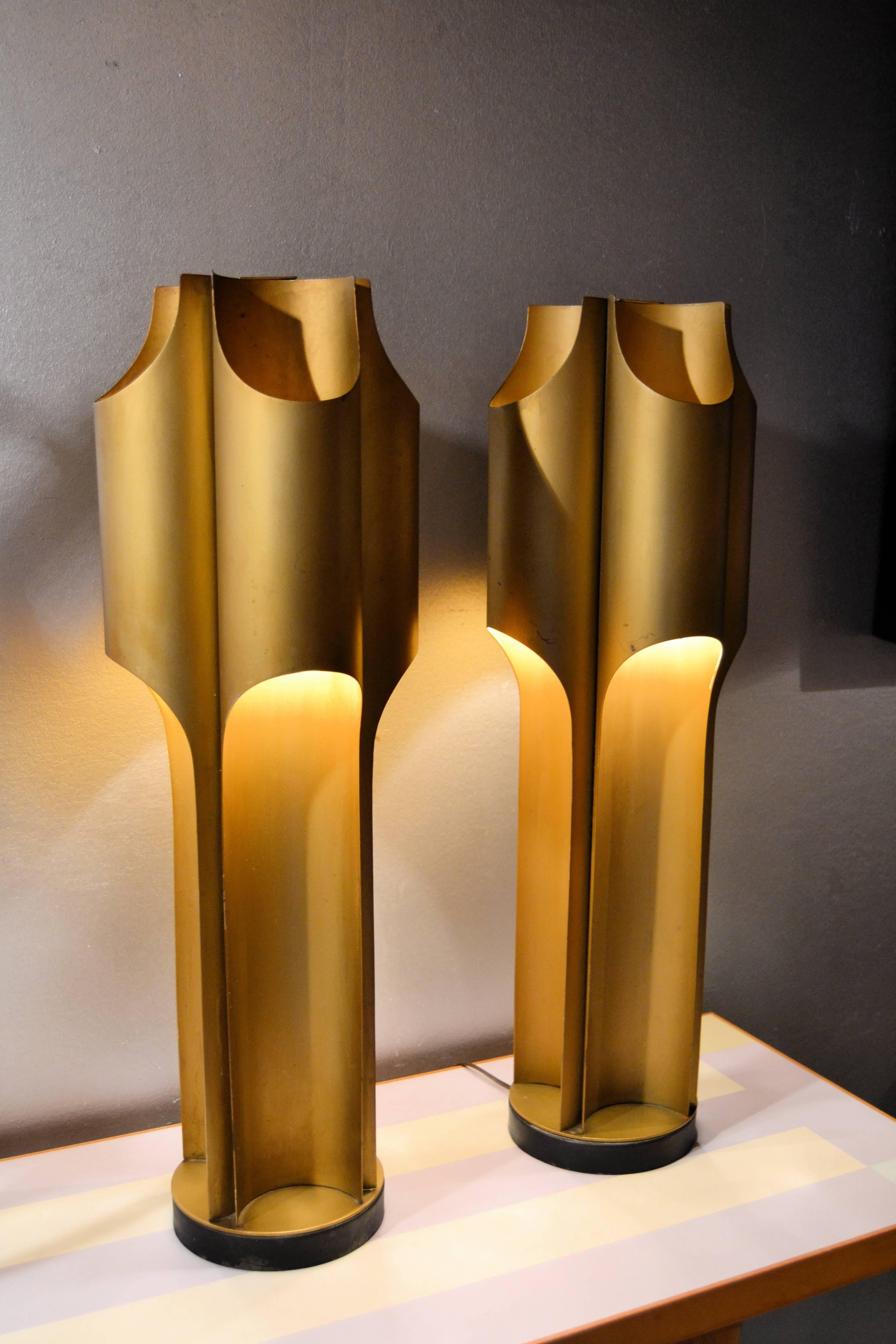 Pair of 1970s metal Maison Charles Orgue. Lamps are composed by 4 bulbs with black leather bases.Original vintage condition 
Lamps are signed in the base Charles & Fils 
base diameter is 17cm