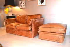 Pair of Leather Sofas and Ottoman