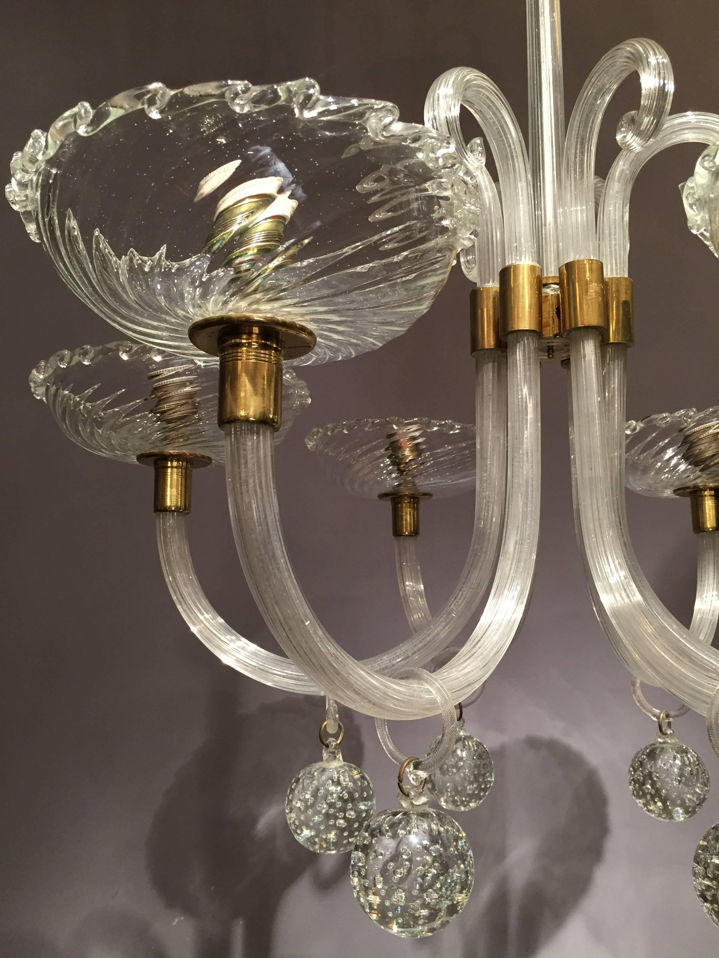 Very rare to find example of an elegant original Seguso six arms blown glass chandelier. 
Sophisticated and pure design, harmonious proportions are the signature of the best manufactures. 
All in this chandelier seems to be simple but all the blown