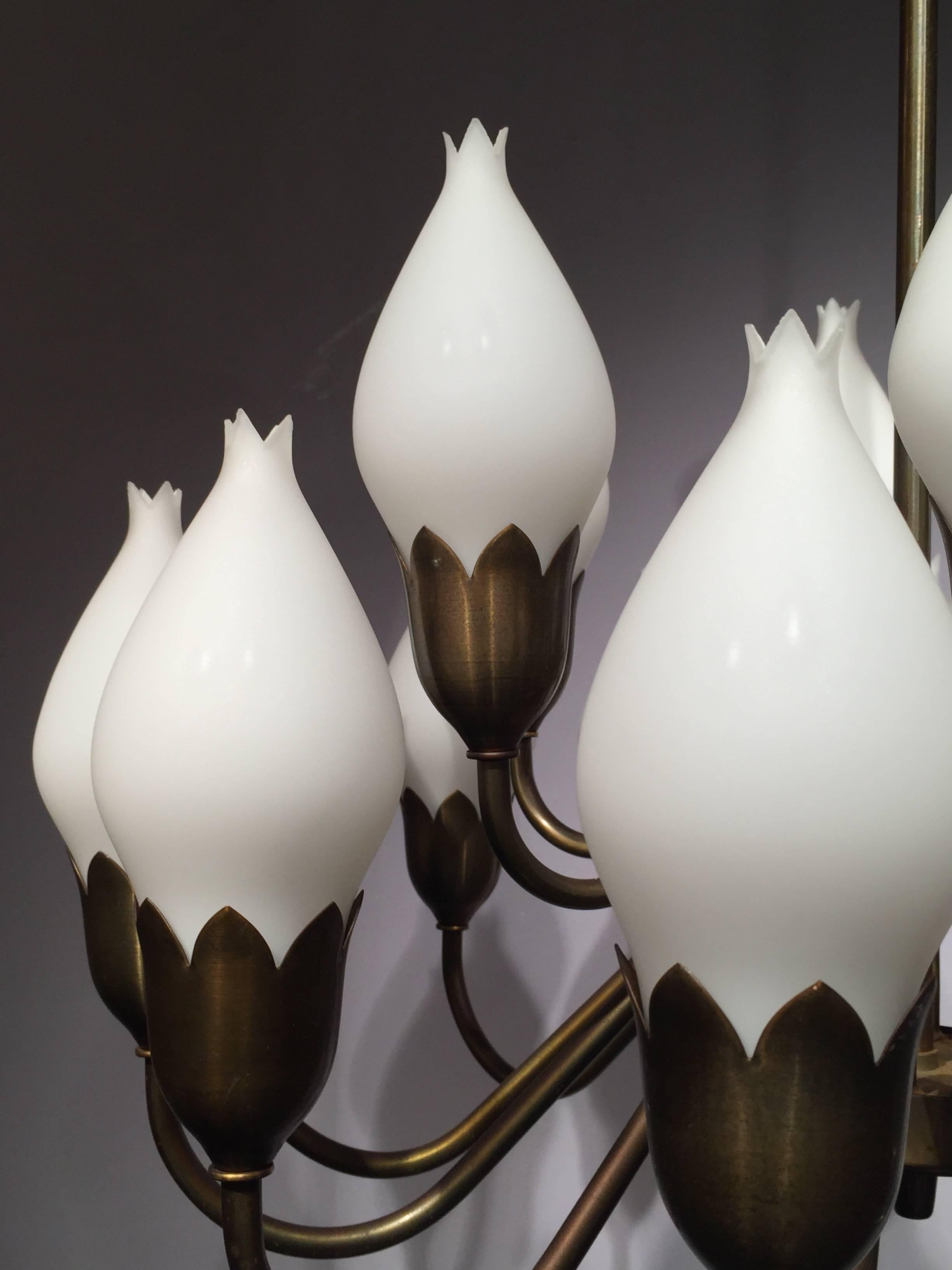 Eighteen-light chandelier in opaline glass from Fog and Morup, Denmark in perfect condition. Two extra opaline in spare parts.

Free shipping for all European destinations and a white glove service from my shop to you if the item is purchased thru