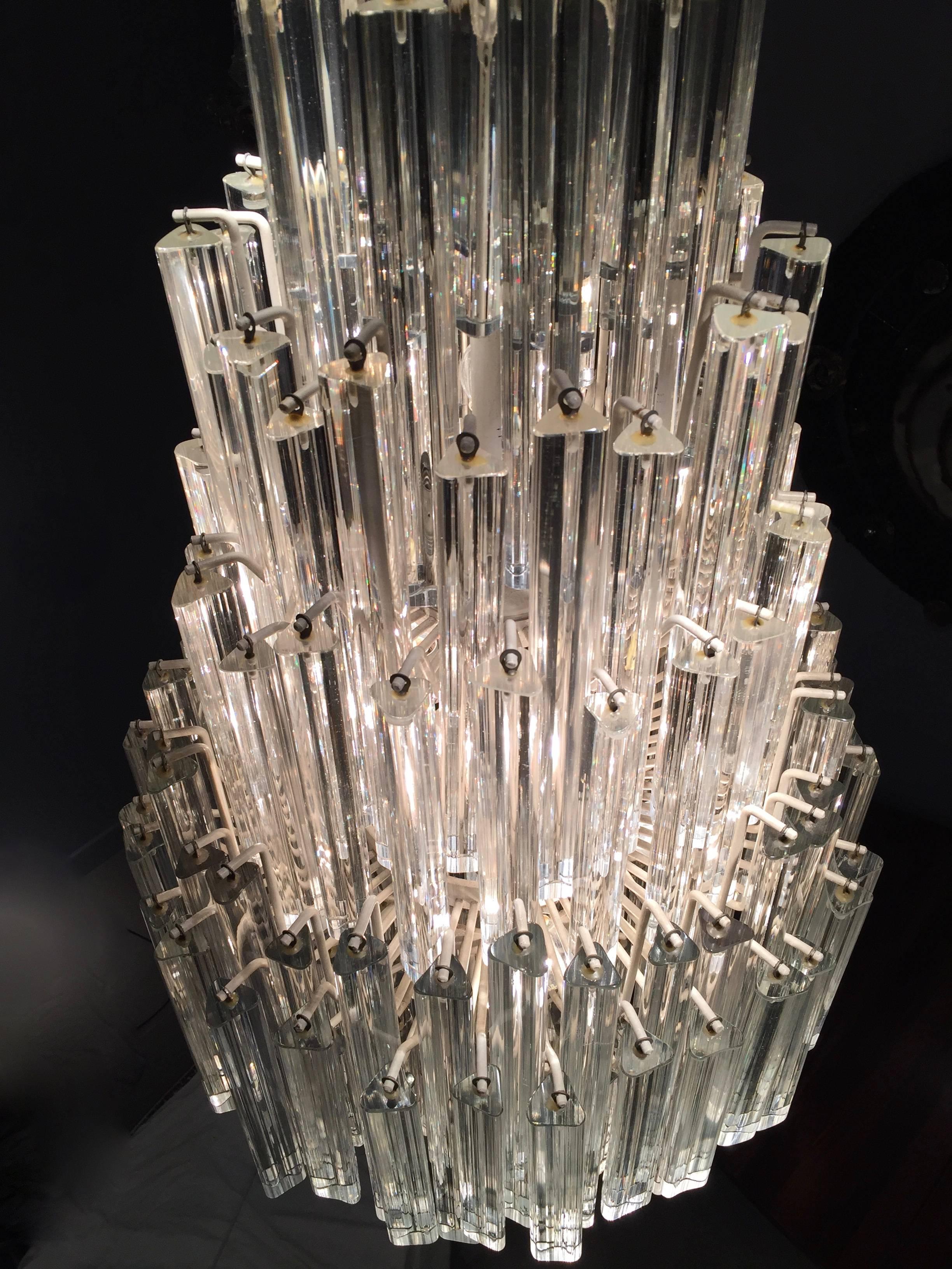 Rare model with characteristic shape. 100% authentic Venini glass chandelier acquired from the first owner with original spare parts. Chandelier from the 