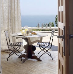 Cantori Romeo Round Dining Table with Calacatta Ceramic Top and Sculptural Base