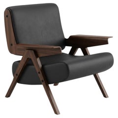 Sillón Lina — Gianfranco Frattini para Tacchini - Sillón de cuero negro con base de nogal