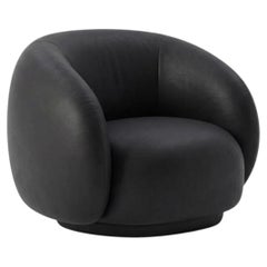 Jonas Wagell pour Tacchini « Julep » : fauteuil de luxe italien aux accoudoirs incurvés, en cuir noir