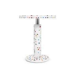 Tavolino rotondo "Kyoto" di Memphis Milano, realizzato con la tecnica del terrazzo, progettato da Shiro Kuramata