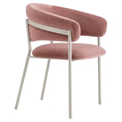 Sillón «Penélope» de terciopelo rosa con reposabrazos de Cantori, diseñado por Maurizio Manzoni