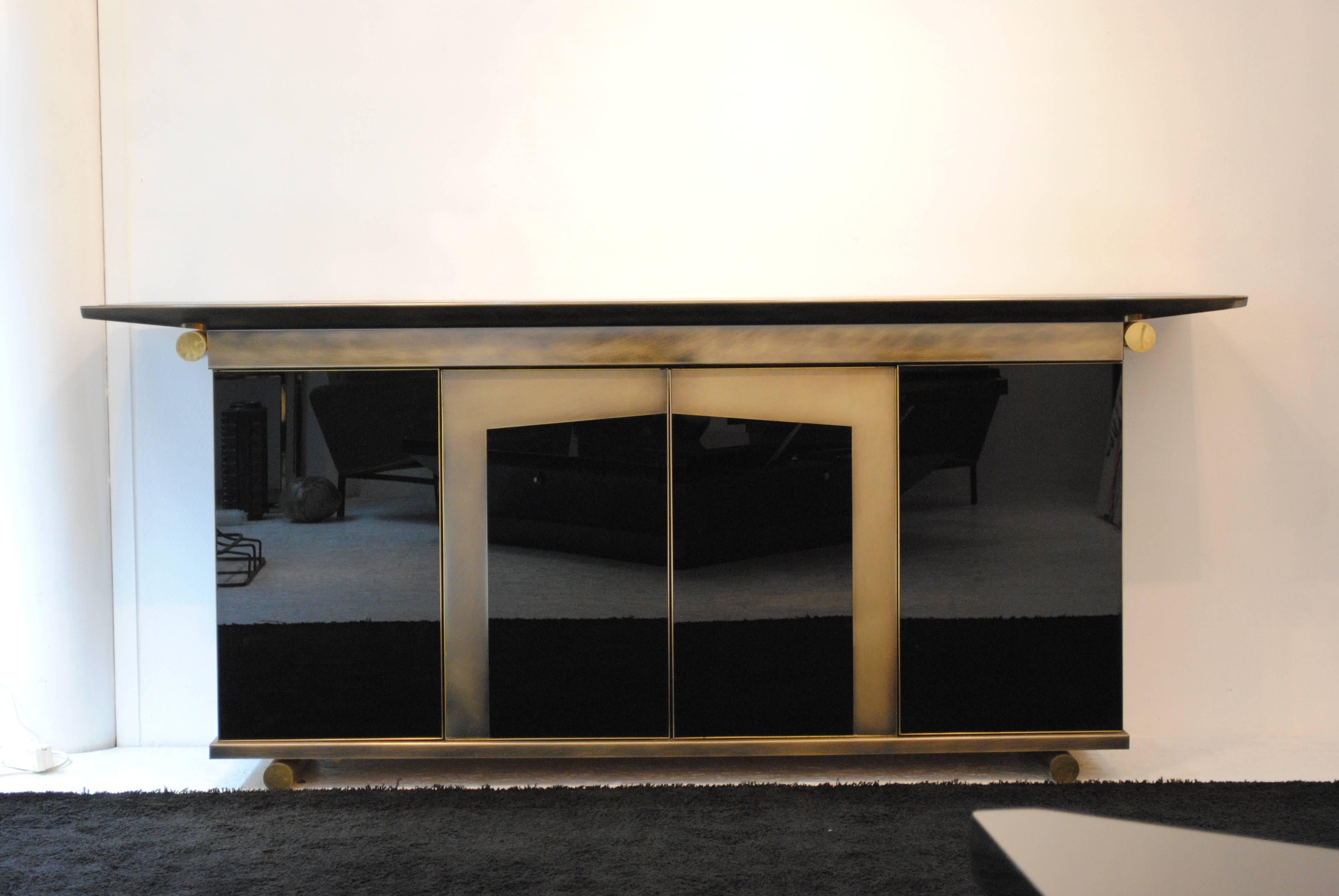 A never seen before spectacular high quality sideboard by Belgochrom, Belgium, 1970s.
This neoclassical piece combined hyalith glass, bronze patinated steel with gold-plated brass accents.

Very good vintage condition, a great match with Romeo