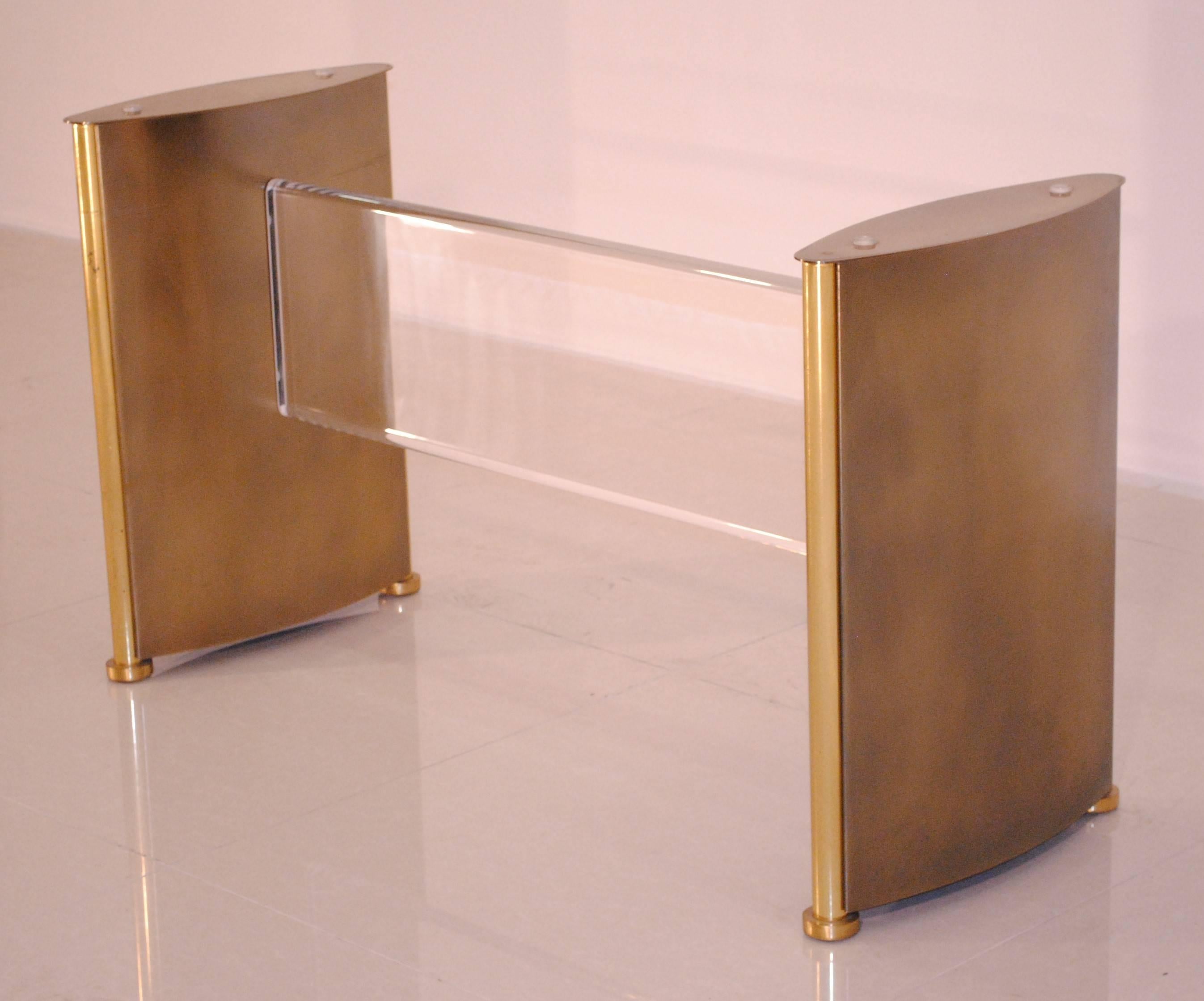 A very classy Lucite, brushed bronze patina and gold-plated brass details dining table base, can also be used as wall console.
The very solid base can easily support a very large top.

Belgochrom is a high quality Belgian fabrication of the late