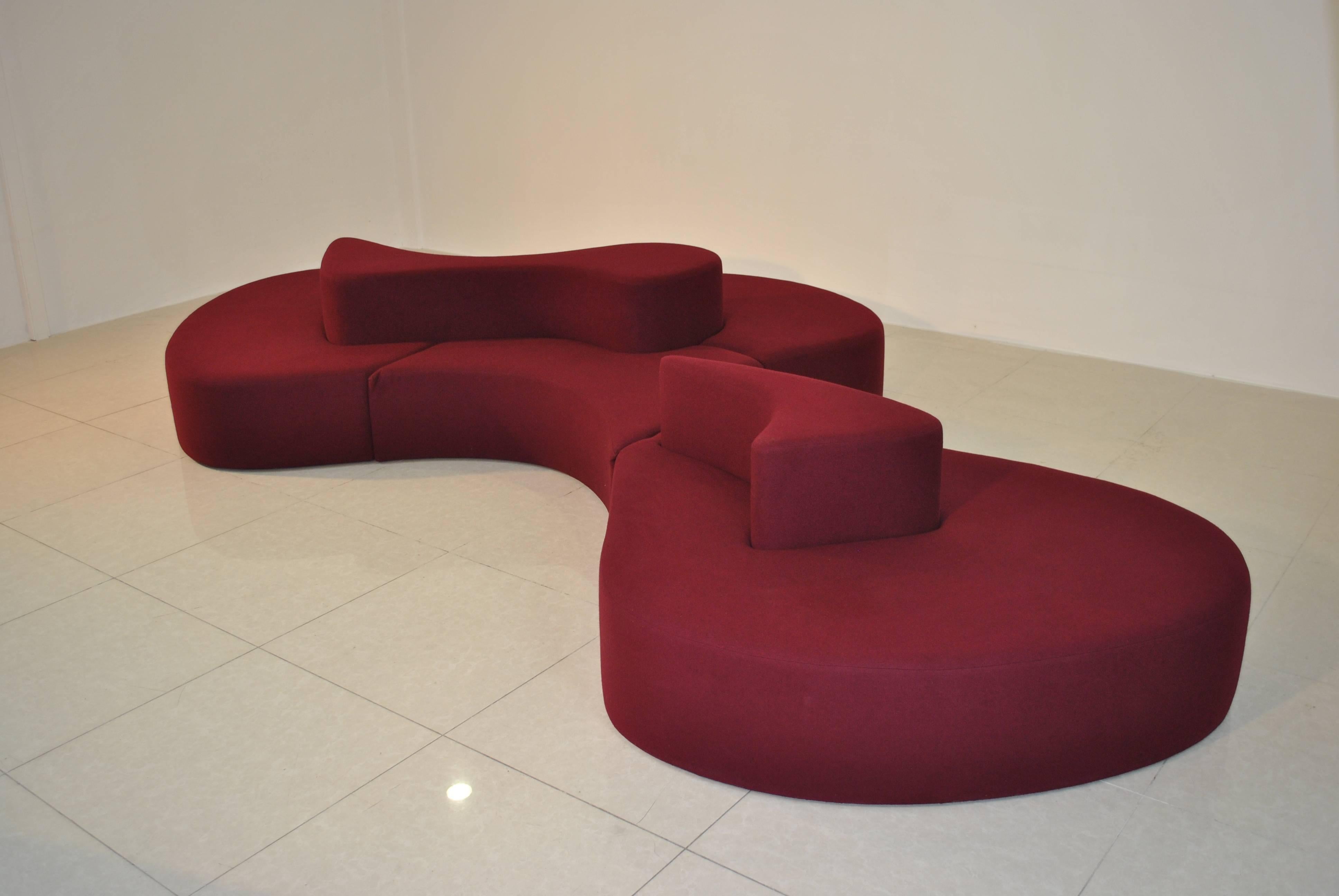 A spectacular and beautiful sectional island sofa. The sofa was designed for a private estate just outside Paris in the 1980s.The fabrication is German.
Four cushions come with the sofa.

The felt-like fabric is in good vintage condition with