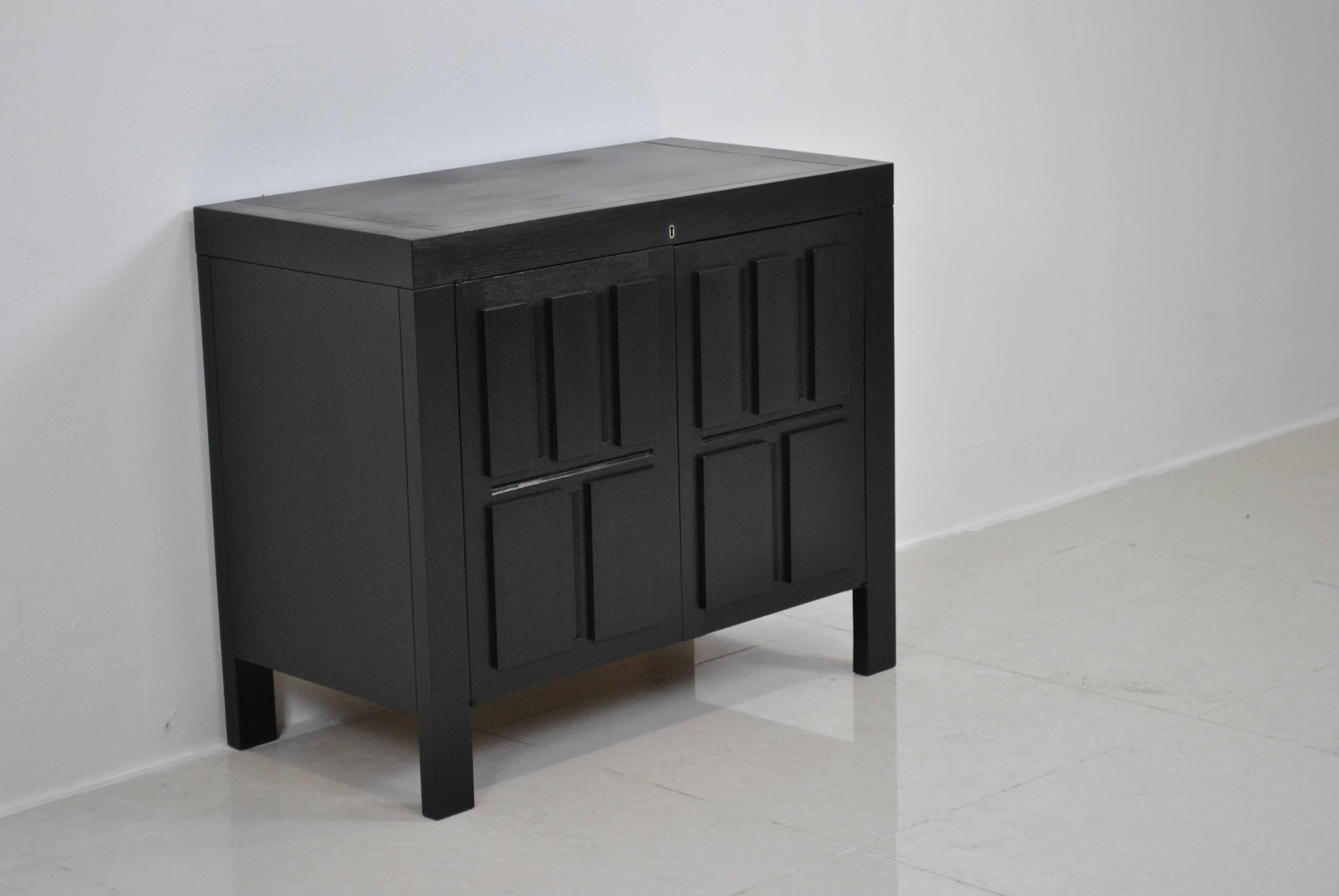 A very rare and nice ebonized oak two-door sideboard made by the famous Belgian cabinetmakers De Coene.
High quality and extremely good condition.

In our other listings we have the four-door version available also.
In the last three pictures