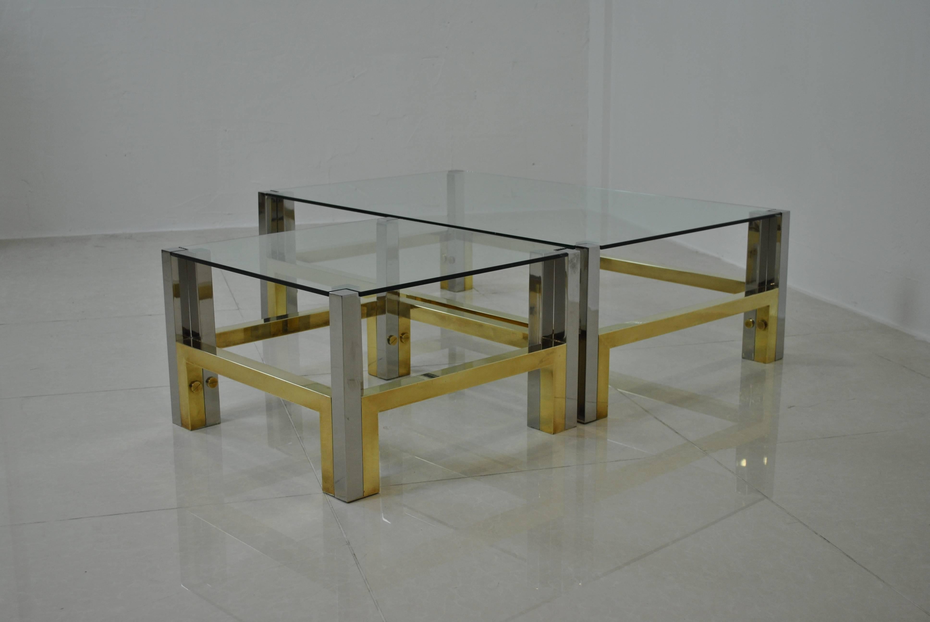 Nice set of matching coffee tables in solid polished bronze and chrome-plated steel by Alfredo Freda and the editor Cittone Oggi for Maison Jansen. 
Very high quality fabrication and signed underneath the bases.

Some evident small occidation