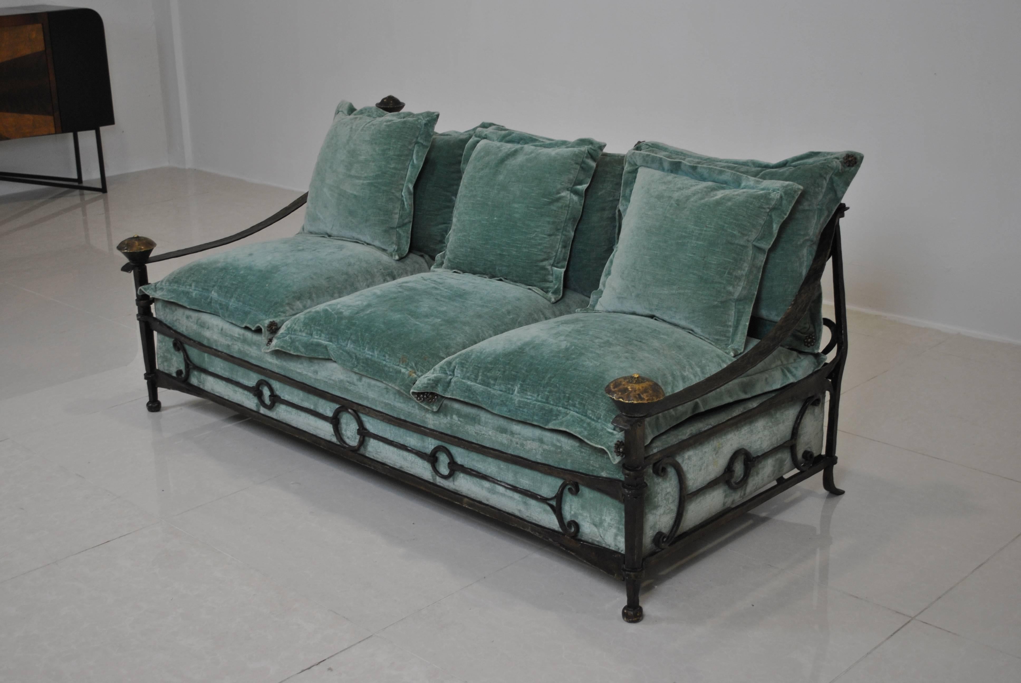 Important and rare wrought iron with bronze details sofa by Sido and François Thevenin for the Santangelo Gallery in Paris. The sofa is one of the first pieces made and is in very good condition.

The original fabric has important staining, so it