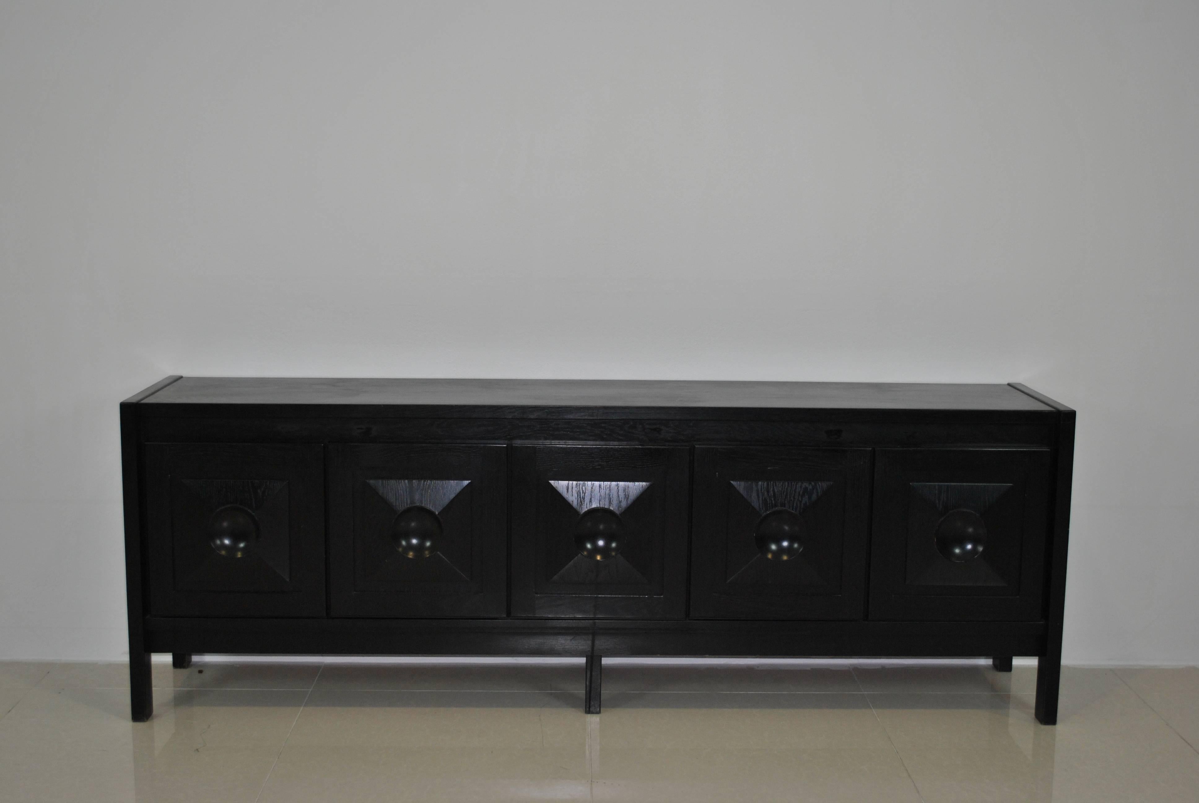 Elegant and large Belgian (Doors graphic sideboard, ebonized oak. Great match with pieces by Decoene, Emiel Veranneman or Alfred Hendrickx.

We also have a two-doors model and a high cabinet of this model listed. The last picture shows this