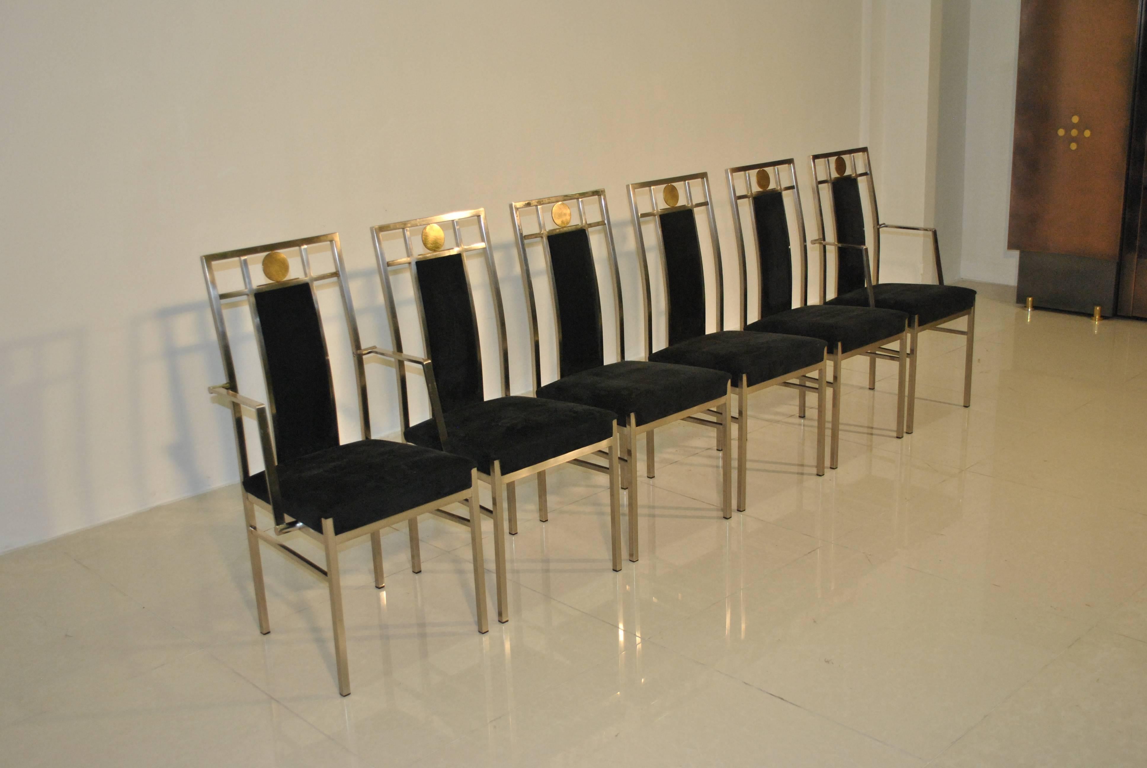 Six beautiful dining chairs in steel, brass and black fabric by Belgo Chrome. Modern and neoclassical look that matches Maison Jansen and Hollywood Regency pieces.
Two chairs have arm rests.

We have the matching pieces like tables and a