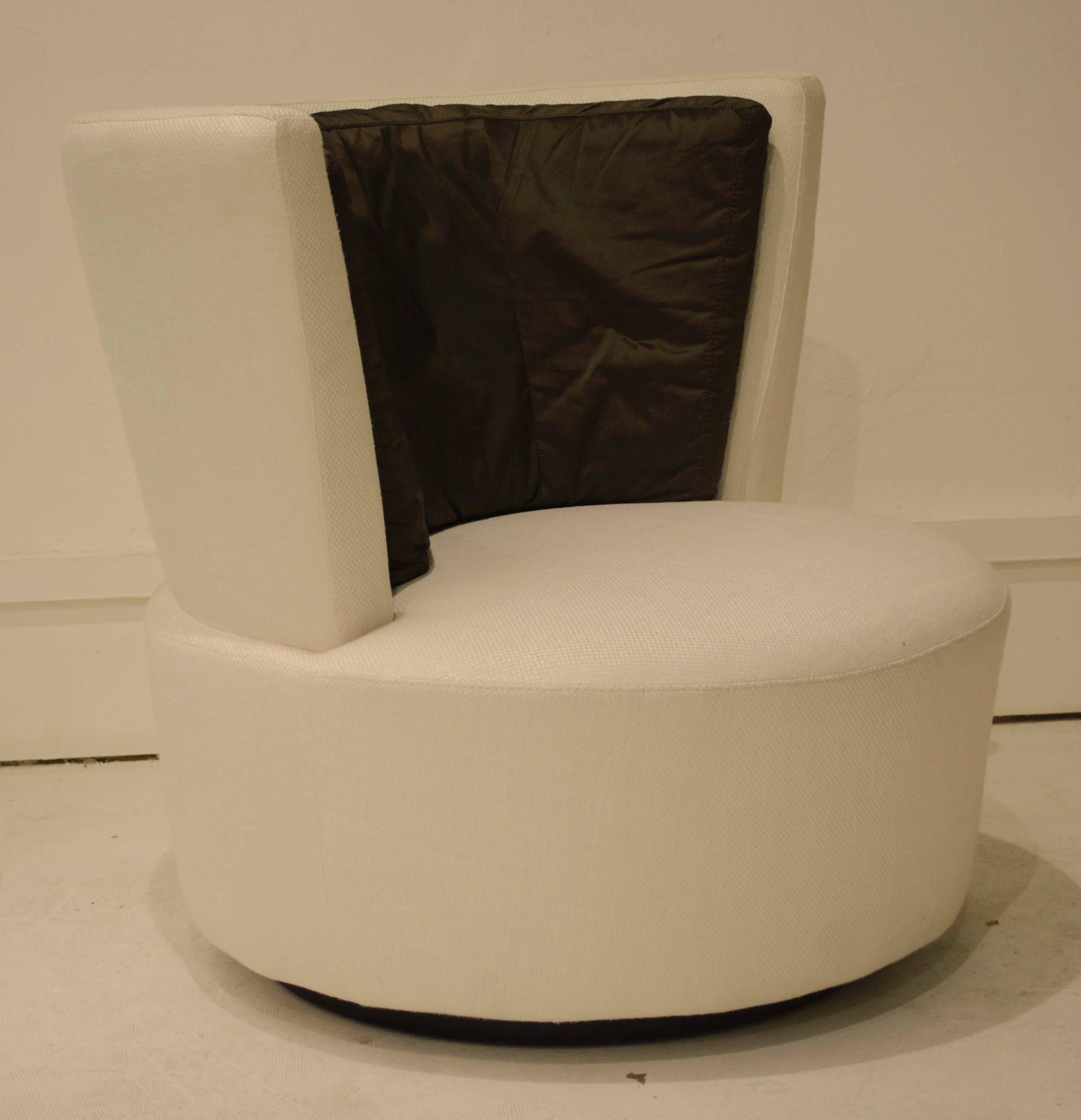 A custom design and unique set of Kagan swivel chairs. The brown and ivory fabric chairs have been the designed for the Lions Club Headquarters at Paris.
We have two pairs available (the other pair that is all ivory is for sale in one of our other