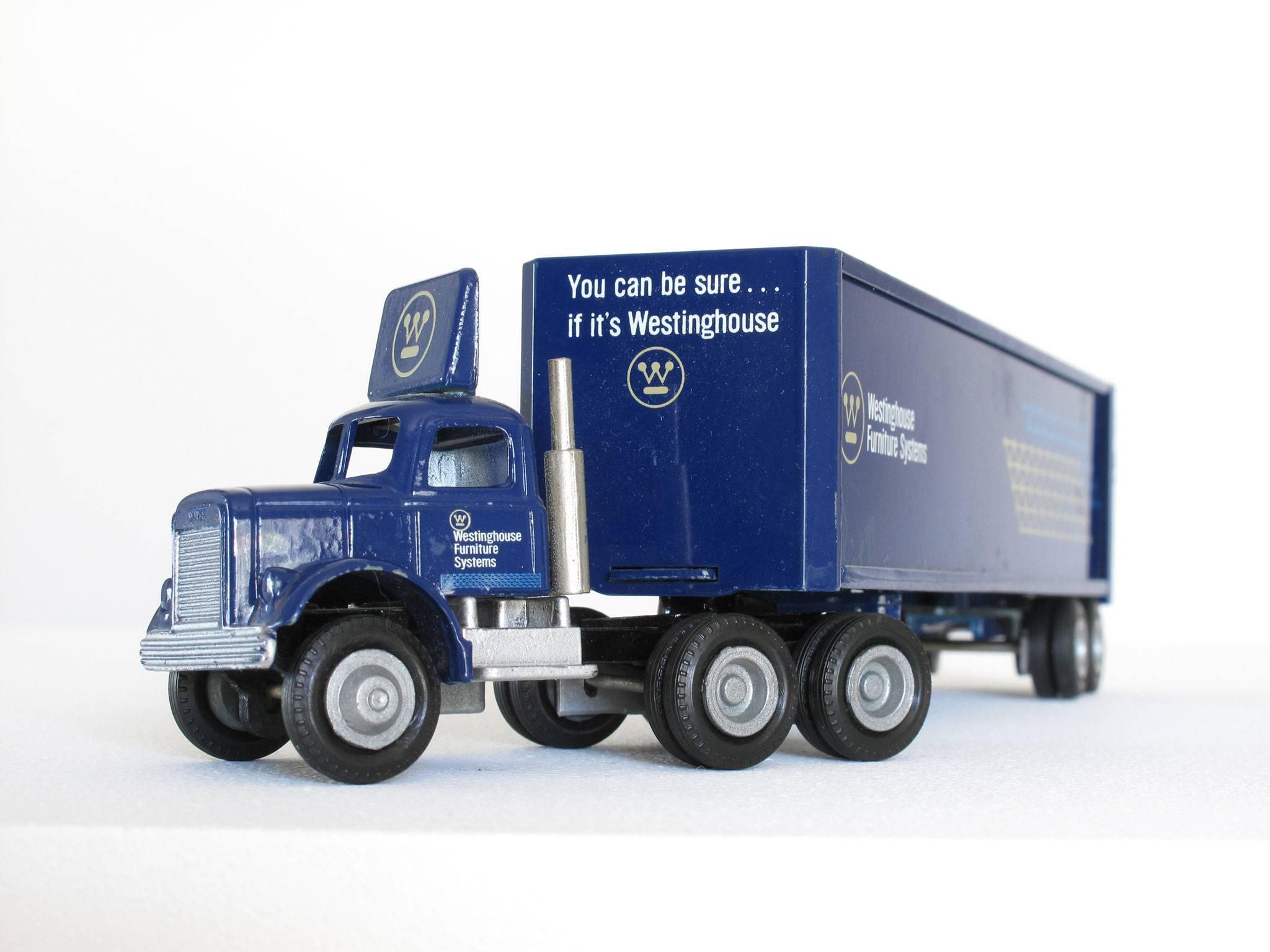 Fun, collectible Westinghouse furniture miniature truck advertising, 1:64 scale model, semi-truck with cab and trailer, made of die cast metal, paint and plastic.
Dimensions: 2 3/8 high x 9 1/4 wide x 1 1/2 deep inches.
Condition: Good