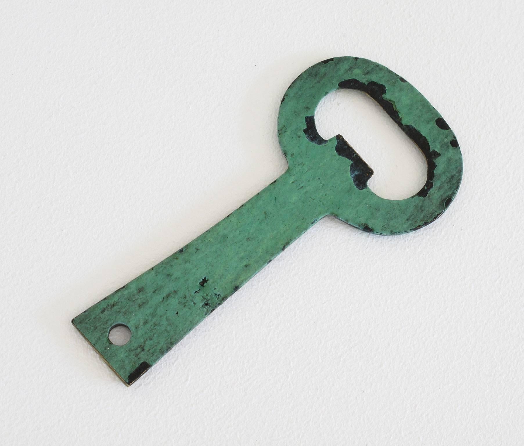 Mid-Century Modern Solid Brass Key Shaped Bottle Opener with Verdigris Patina For Sale