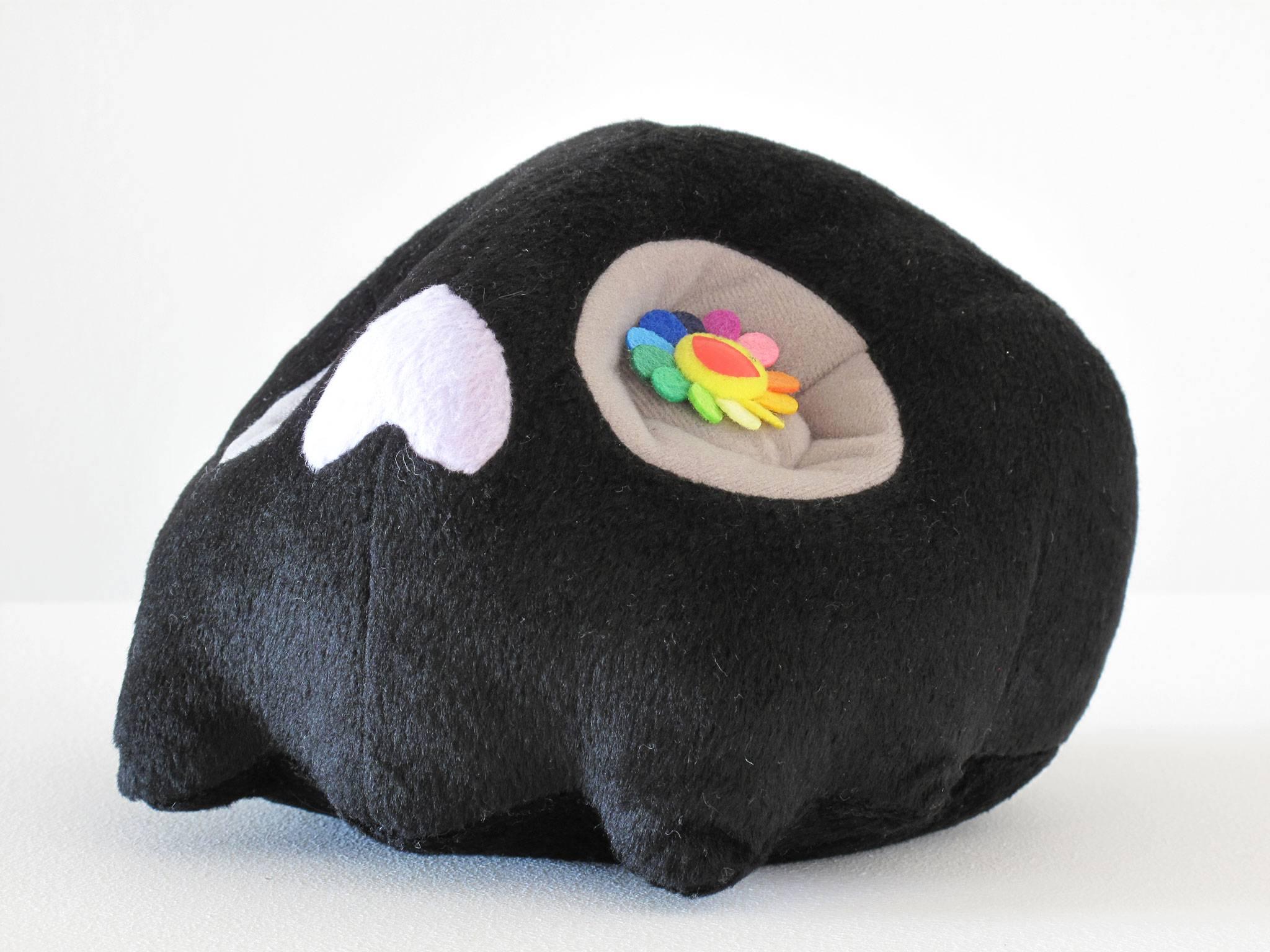 Fun, fuzzy skull by Takashi Murakami, black fantasy creature, plush toy, art doll made in Japan, acquired from Moca 'Murakami' exhibition in 2007. Dimensions: 7 high x 7 wide x 5 deep inches.