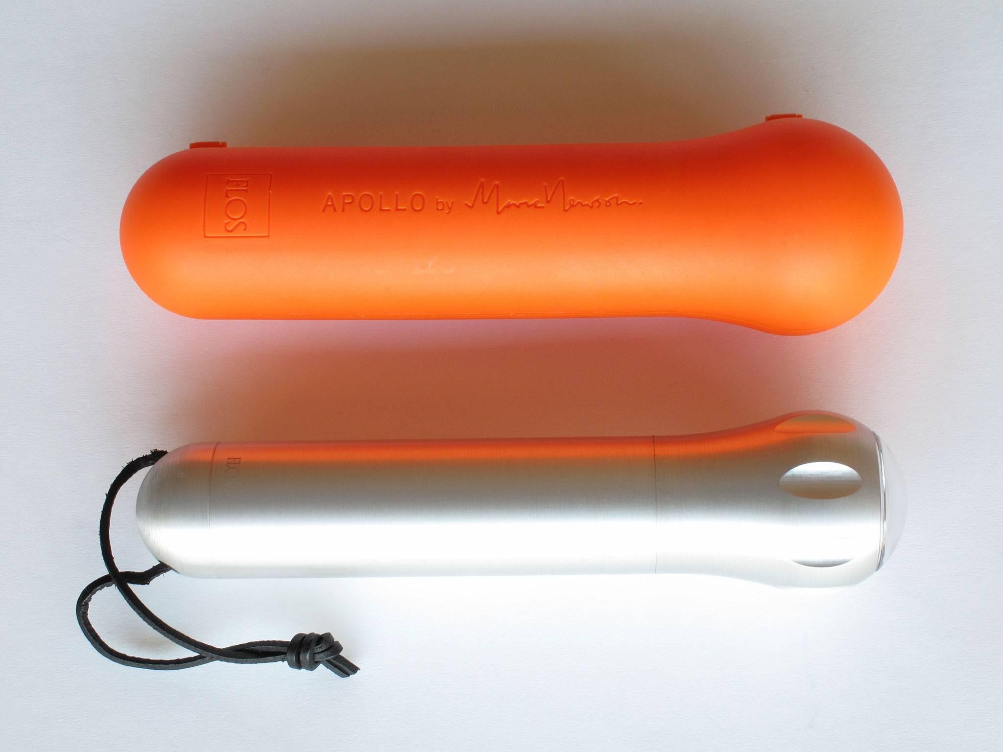 'Apollo' torch design-art object by Australian designer Marc Newson, 1997, machined from a solid lump of aluminum, engraved signature and flos logo, creates a nice beam of light, uses two size D-batteries. Flashlight measures 9.25 in. long x 1.75