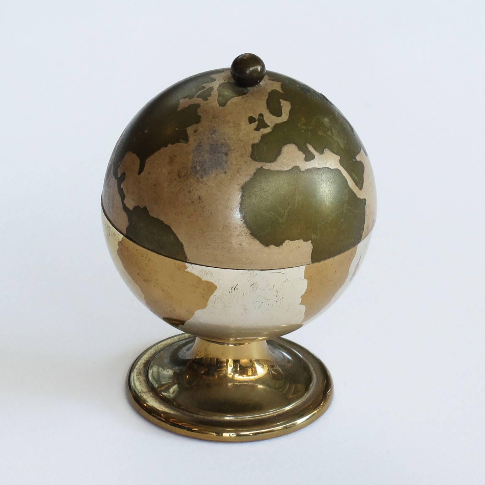 Mid-Century Modern Vintage Deco Style Brass World Globe Table Lighter with Flip Top Lid on Base For Sale