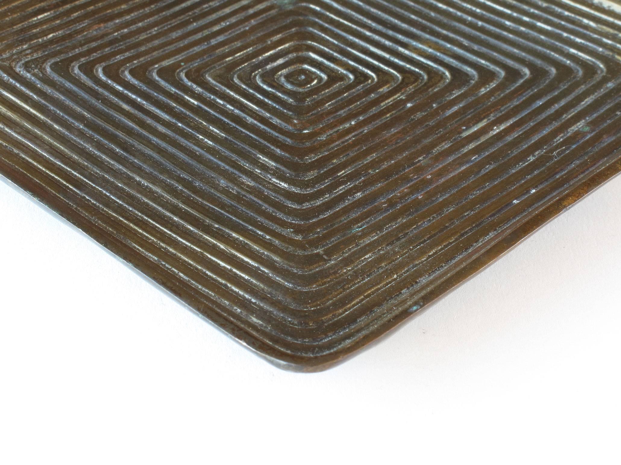 Ben Seibel tray or trivet, brass plated metal, 1950s, Jenfred Ware, New York. Measures: 5/8 high x 7 wide x 7 deep inches.
