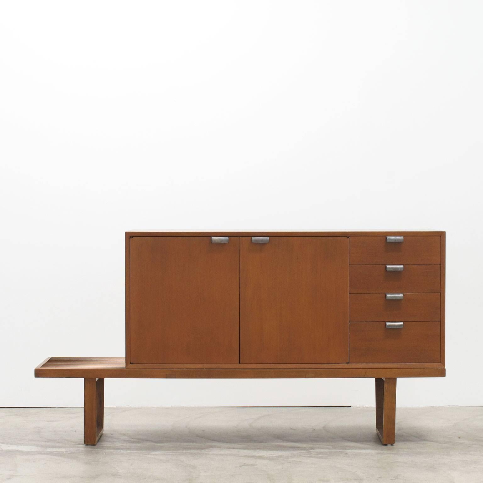 George Nelson designed wood slat bench and cabinet set, with a moveable cabinet featuring four drawers off to one side, and two doors opening to an interior storage compartment with one adjustable shelf, a 1950s Herman Miller pairing in beautiful,