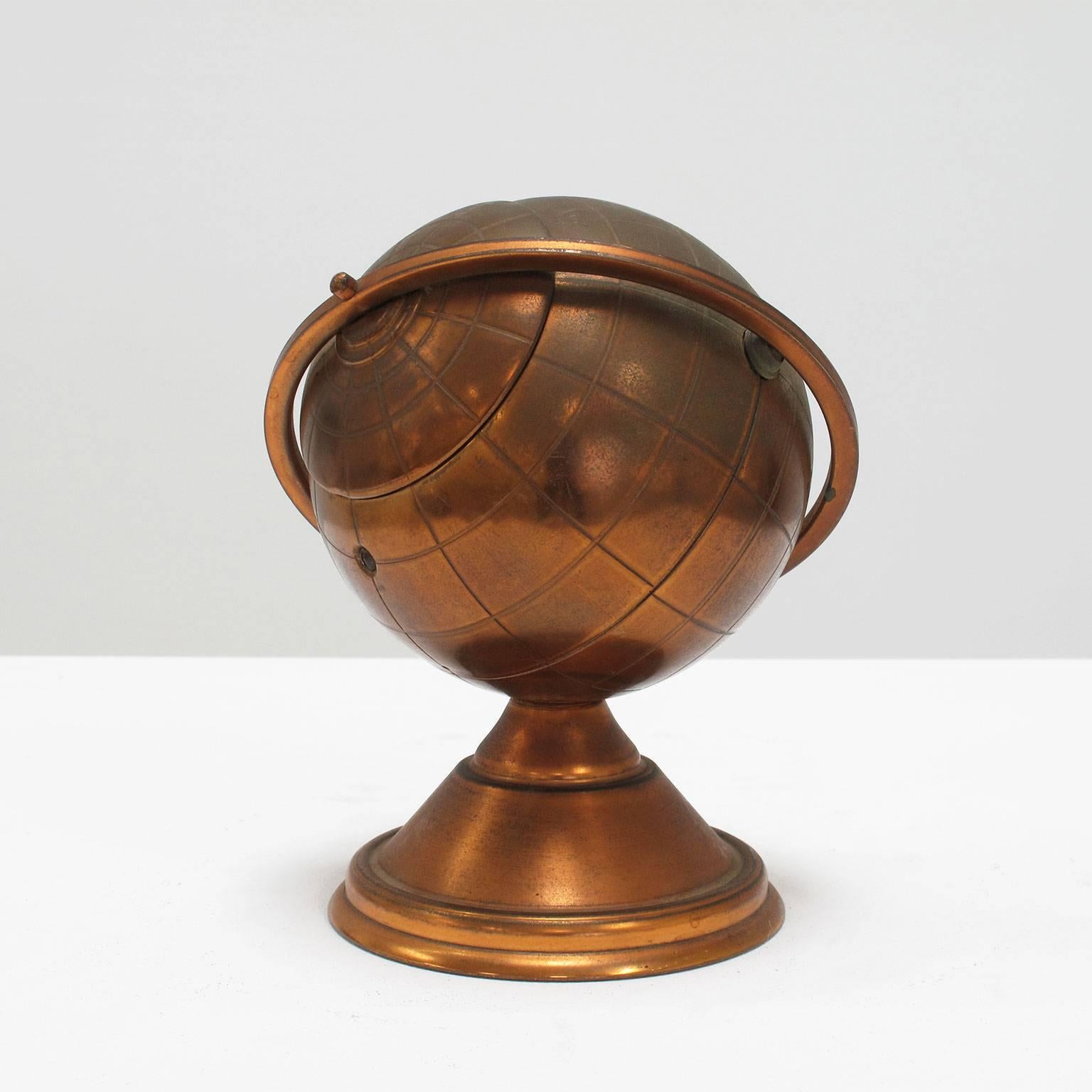 Vintage copper globe decorative object
Condition: Good vintage, warm patina
Mid-Century Modern, America, 1960s
Measurements in inches:
6 high x 5 wide x 4 deep, globe is 4 diameter